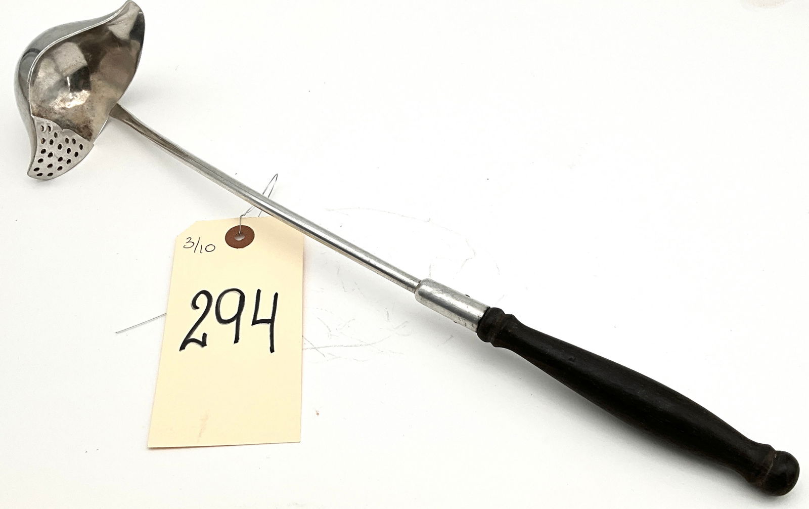 Silver Soldered Waldorf-Astoria Straining Ladle, International Silver Co.: Silver soldered straining ladle by International Silver Co. using silver-soldered construction for the Waldorf-Astoria Hotel, dated 1962. This mid-century modern piece features a perforated bowl secti