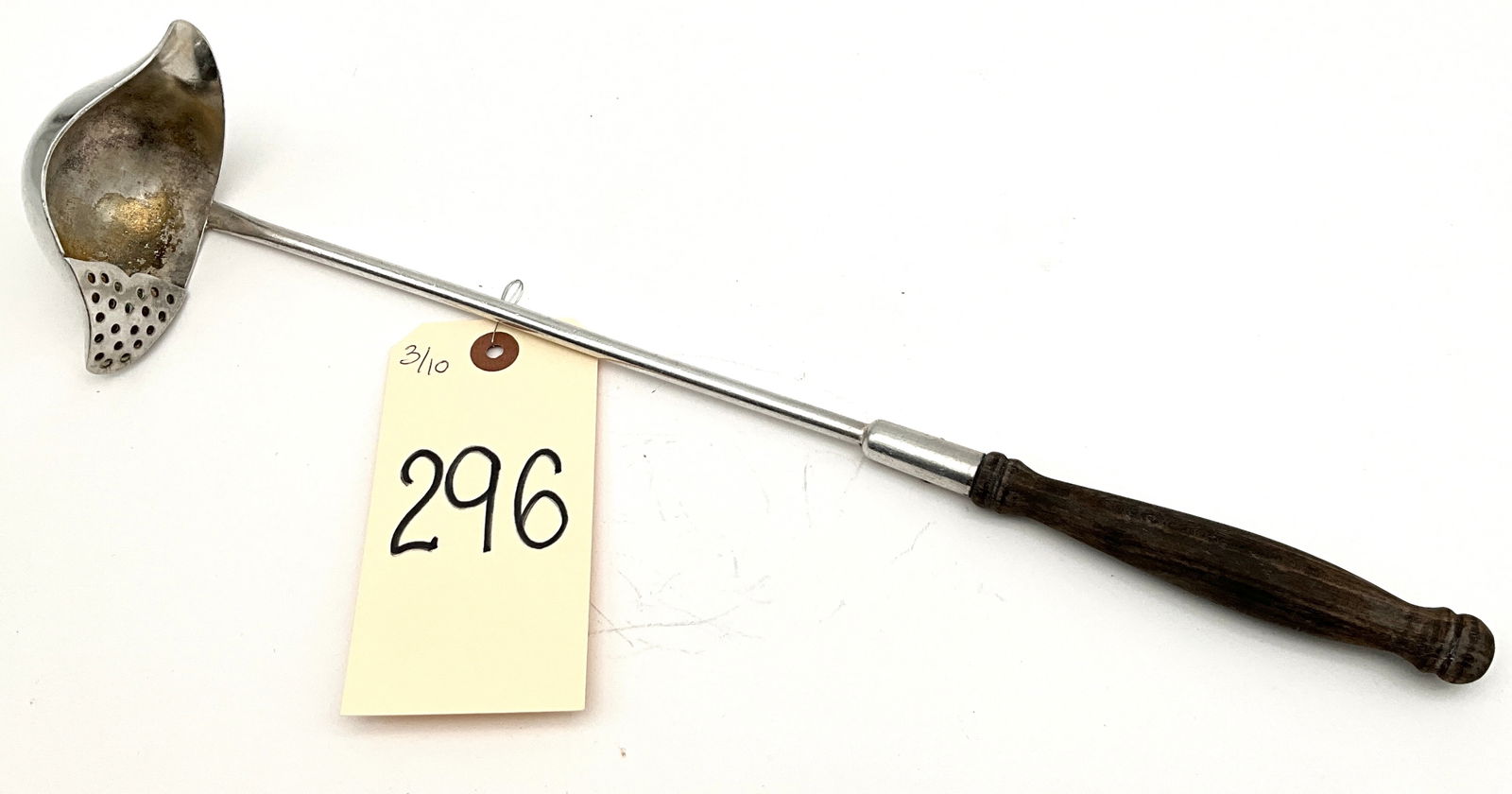 International Silver Co. Waldorf-Astoria Silver-Soldered Ladle with Strainer: This silver-soldered punch or soup ladle was manufactured by the International Silver Co. specifically for the historic Waldorf-Astoria hotel. The piece features a deep bowl with an integrated perfora