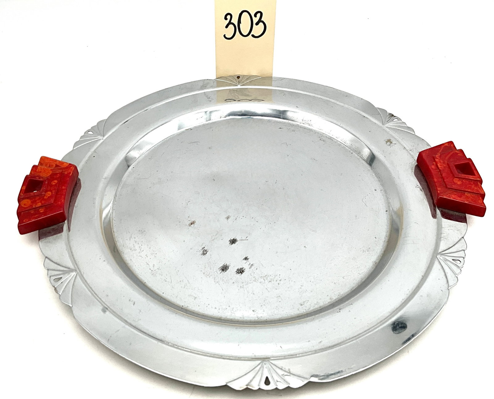 Glo-Hill Gourmates Art Deco Style Chrome and Bakelite Serving Tray: This Art Deco style circular serving tray was manufactured by Glo-Hill for the Gourmates line and features a chrome-plated metal body. The tray is accented by two opposing mottled red Bakelite handles
