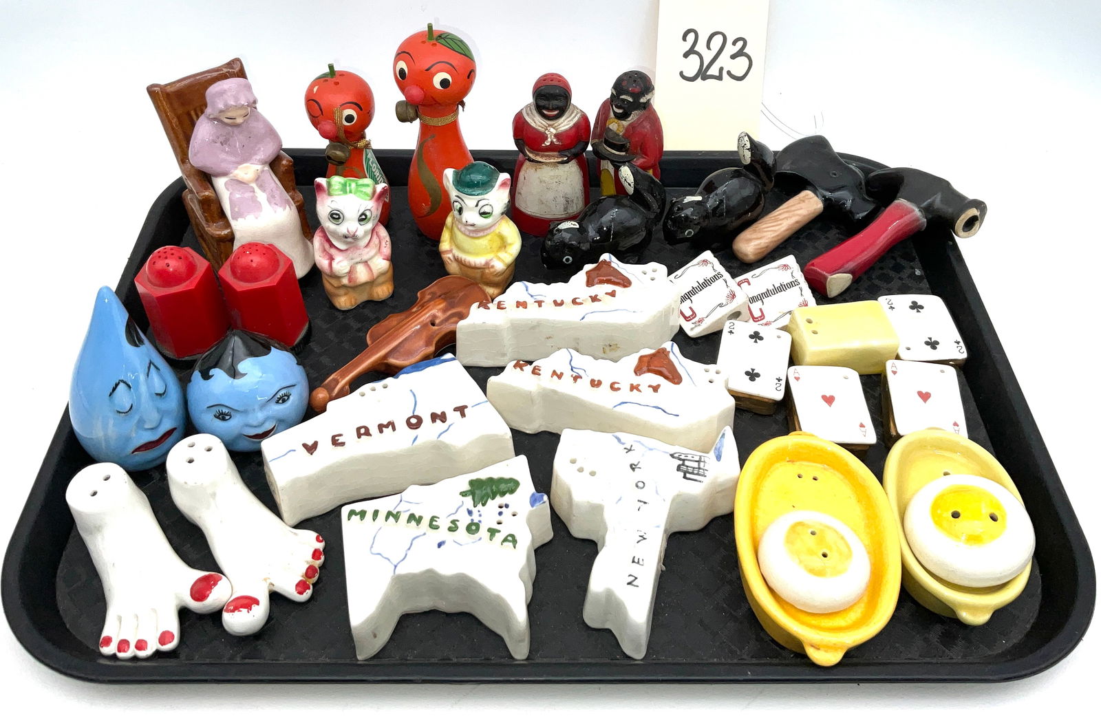 Various Makers, Mid-Century Novelty Salt and Pepper Shaker Collection, Ceramic and Plastic: This diverse assortment of mid-century novelty salt and pepper shakers features a variety of ceramic and plastic sets in figural, geographic, and household themes. Highlights include hand-painted