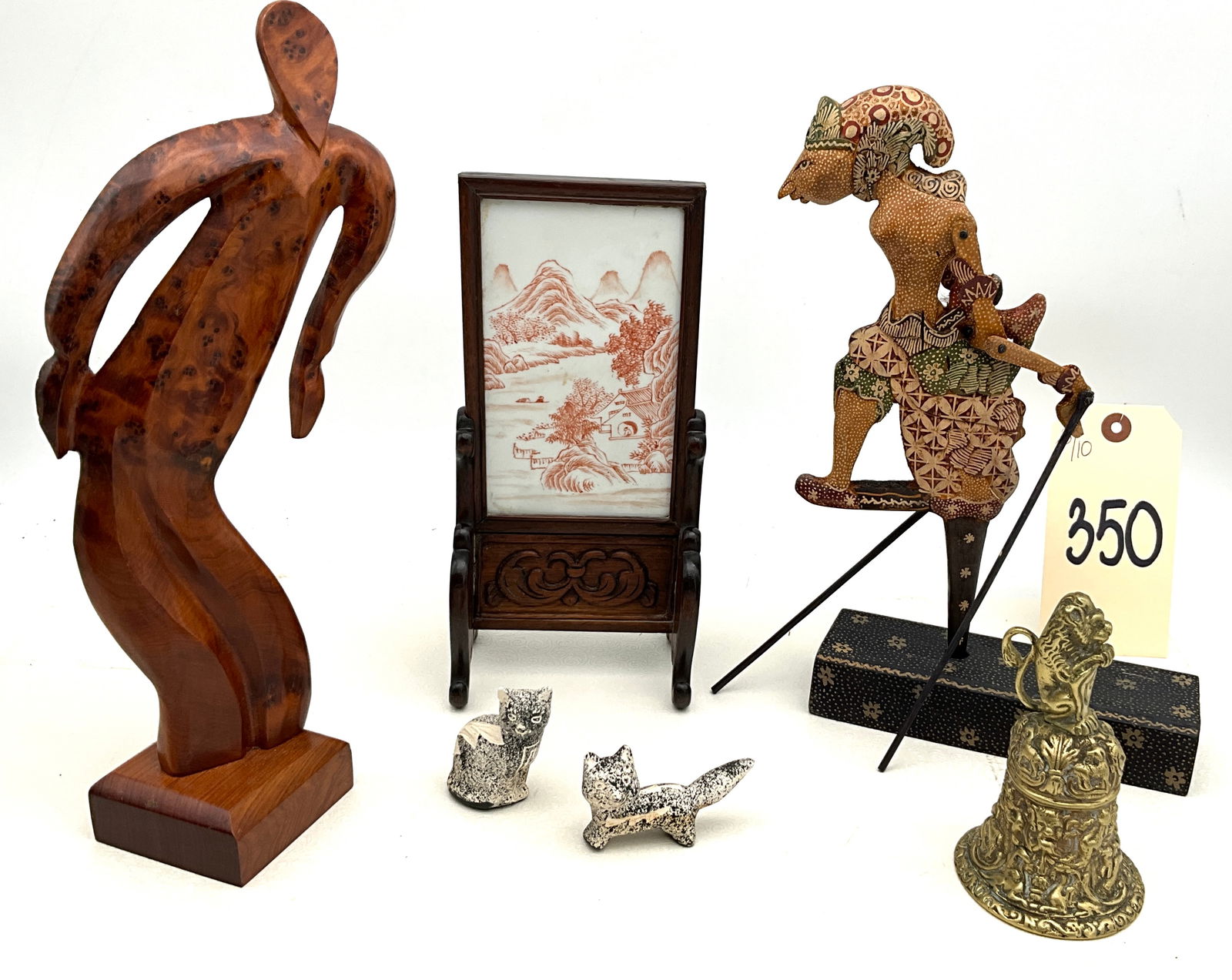 Collection of Balinese and Asian Decorative Arts, Including Burl Wood Sculpture and Wayang Figurine,: This diverse collection of global decorative arts features a Mid-Century Modern abstract figurative sculpture hand-carved from polished burl wood, likely of Balinese origin. The group includes an Indo
