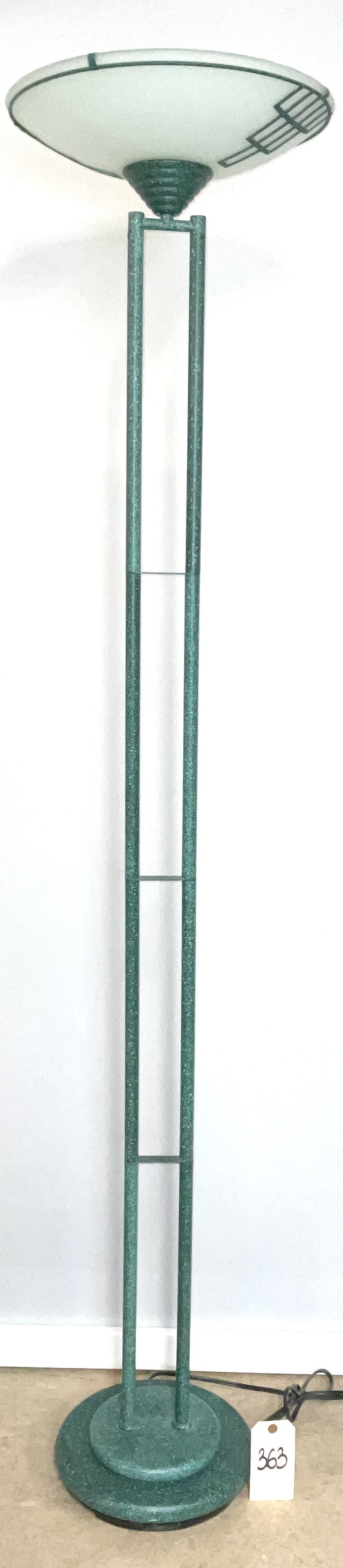 Postmodern Frosted Glass and Speckled Metal Torchiere Floor Lamp: This postmodern torchiere floor lamp features a shallow frosted white glass bowl shade accented by a decorative dark metal geometric grid. The dual-pole tubular metal stem and tiered circular base are
