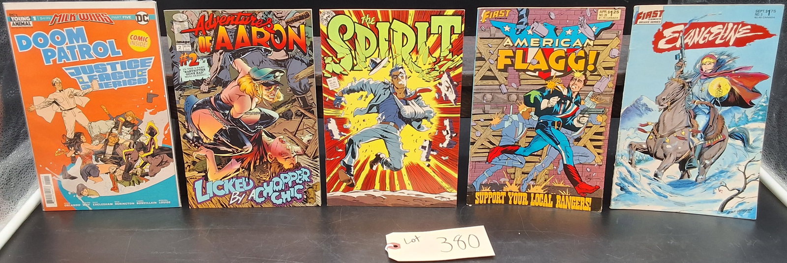 Lot of 5 Misc Vintage Comics: Lot of 5 Misc Vintage Comics: Justice League America, Adventures of Aaron, The Spirit, American Flagg!, Evangeline Condition All property is sold in "as is" condition and all sales are final. Teel