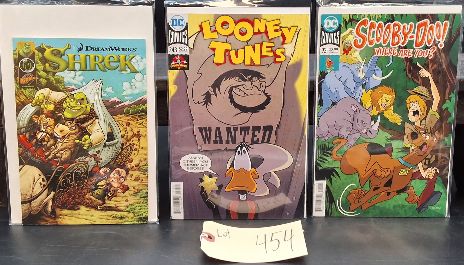 Lot of 3 Misc Comics: Shrek, Looney Tunes #243, Scooby-Doo! #93: Lot of 3 Misc Comics: Shrek, Looney Tunes #243, Scooby-Doo! #93 Condition All property is sold in "as is" condition and all sales are final. Teel Auctions and its consignor make no representations or 