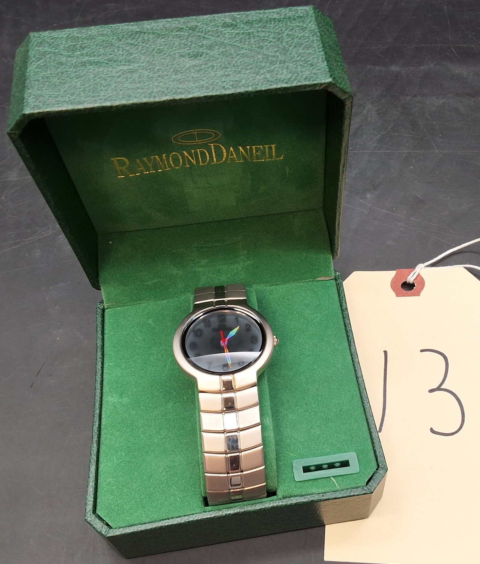 Raymond Daniel Quartz Watch: Raymond Daniel Quartz Watch Condition All property is sold in "as is" condition and all sales are final. Teel Auctions and its consignor make no representations or warranties, express or implied,