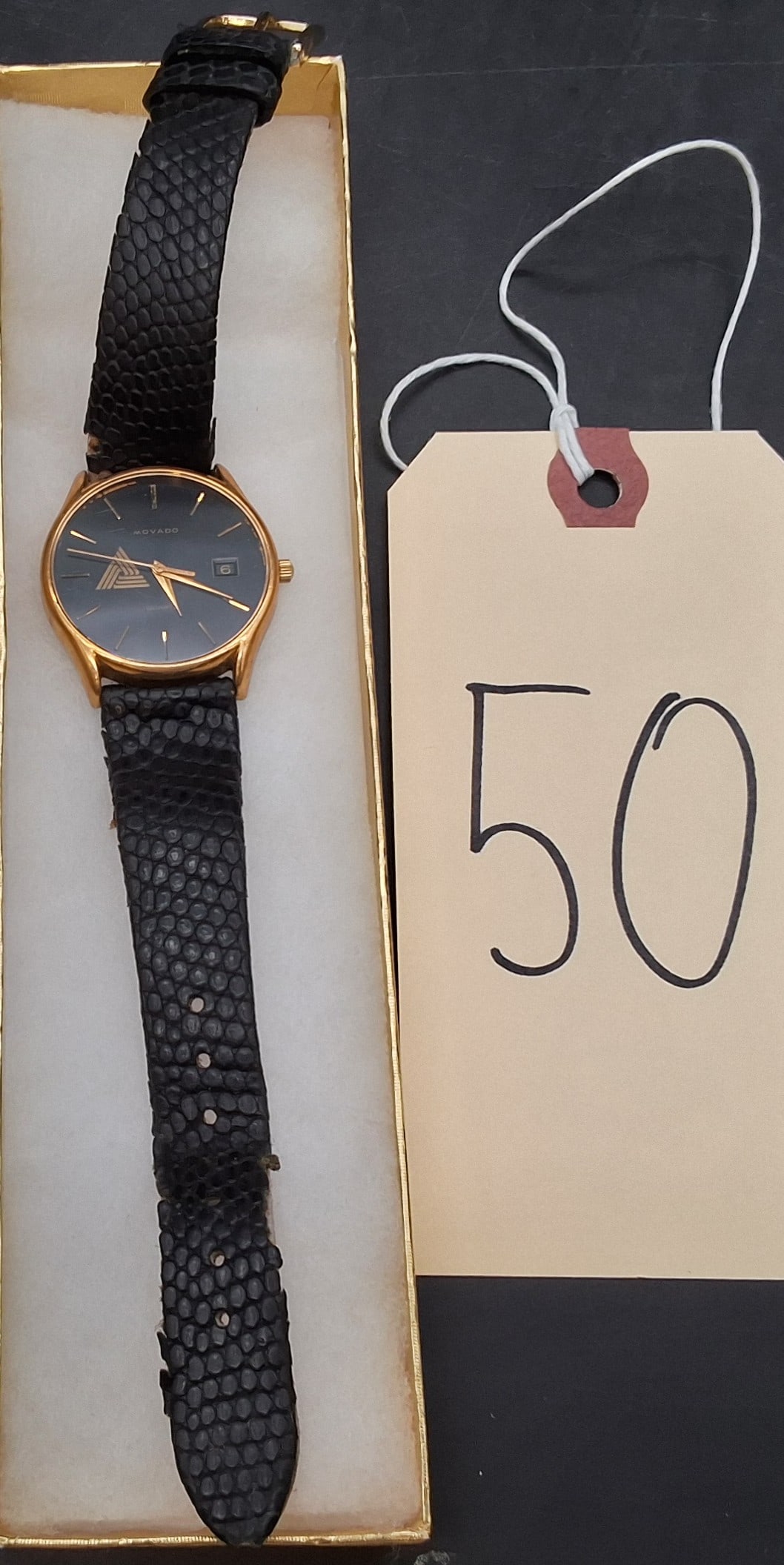 Movado quartz watch, engraved 20.0270: Movado quartz watch, engraved 20.0270 Condition All property is sold in "as is" condition and all sales are final. Teel Auctions and its consignor make no representations or warranties, express or