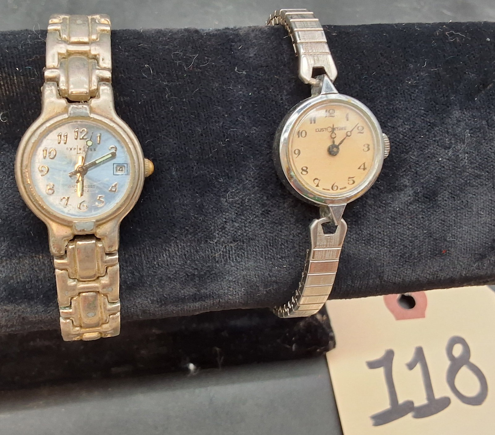 Lot of 2 Silver toned watches: customtime, Express LA: Lot of 2 Silver toned watches: customtime, Express LA Condition All property is sold in "as is" condition and all sales are final. Teel Auctions and its consignor make no representations or