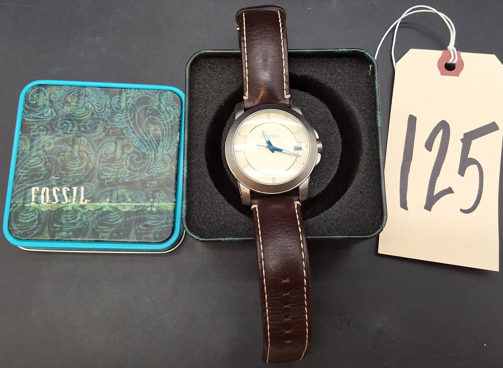 Fossil FS4497-111211 men's analog watch: Fossil FS4497-111211 men's analog watch Condition All property is sold in "as is" condition and all sales are final. Teel Auctions and its consignor make no representations or warranties, express or