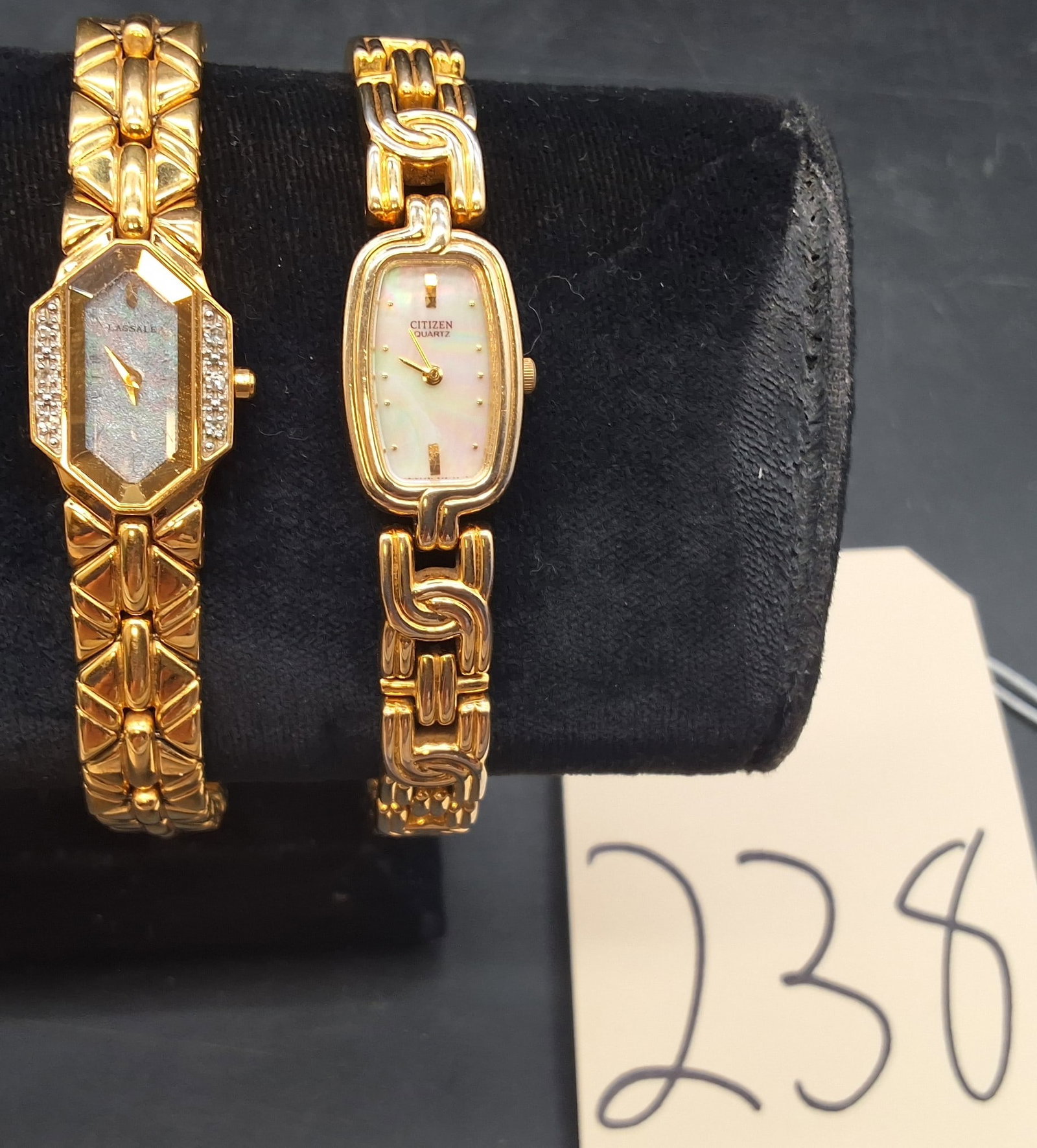 Pair of gold tone ladies watches: Lassale 430450 and Citizen Quartz with mother of pearl dial 410484: Pair of gold tone ladies watches: Lassale 430450 and Citizen Quartz with mother of pearl dial 410484 Condition All property is sold in "as is" condition and all sales are final. Teel Auctions and its 