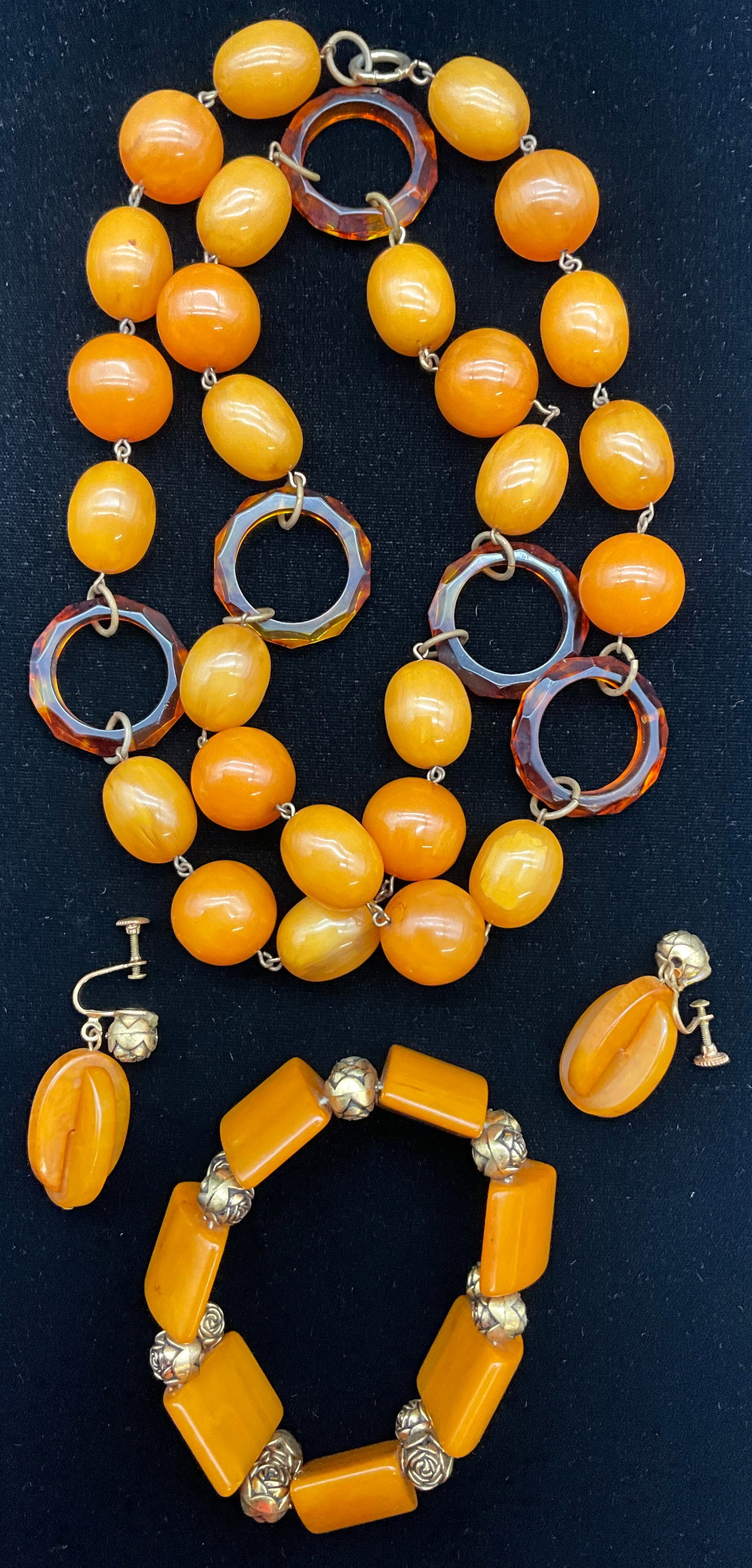A Collection of Butterscotch and Amber-Toned Bakelite Costume Jewelry - 2