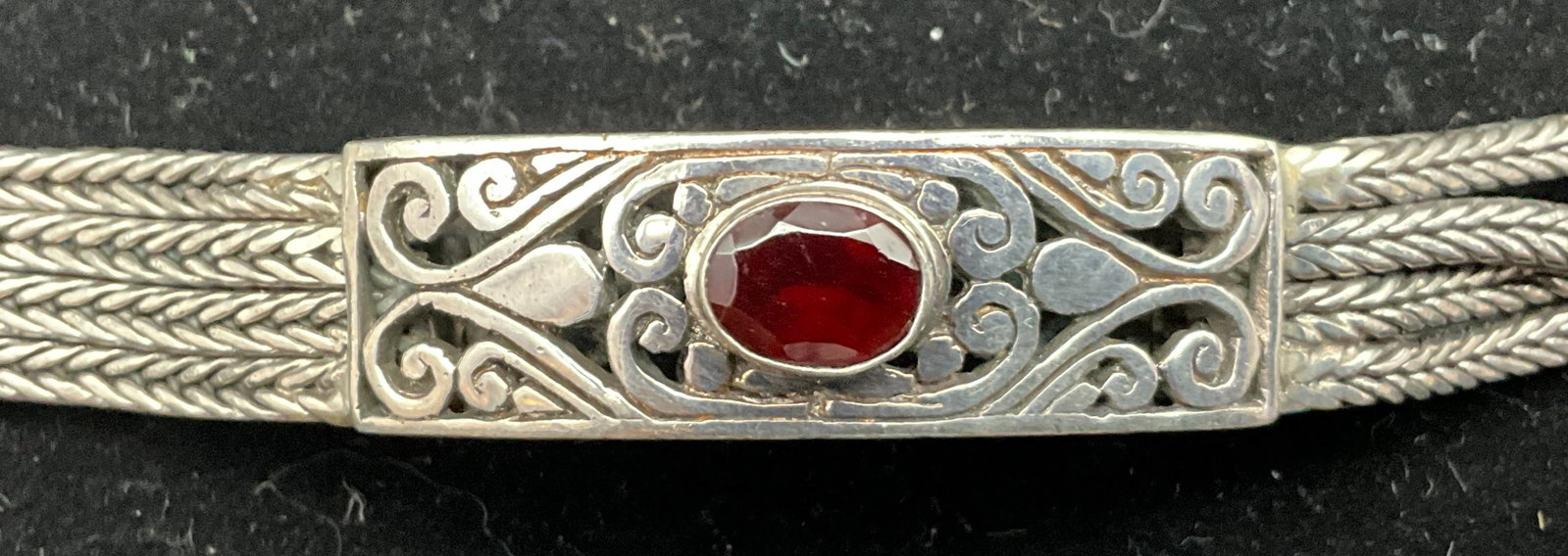 Sterling Silver Bali-Style Multi-Strand Woven Bracelet with Garnet Accent - 7