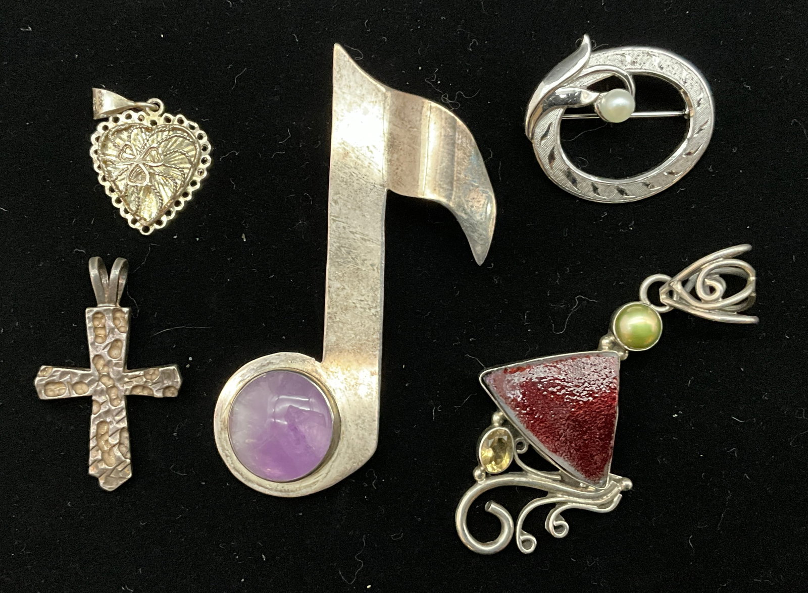 A Collection of Sterling Silver Jewelry Including Brooches and Pendants - 2
