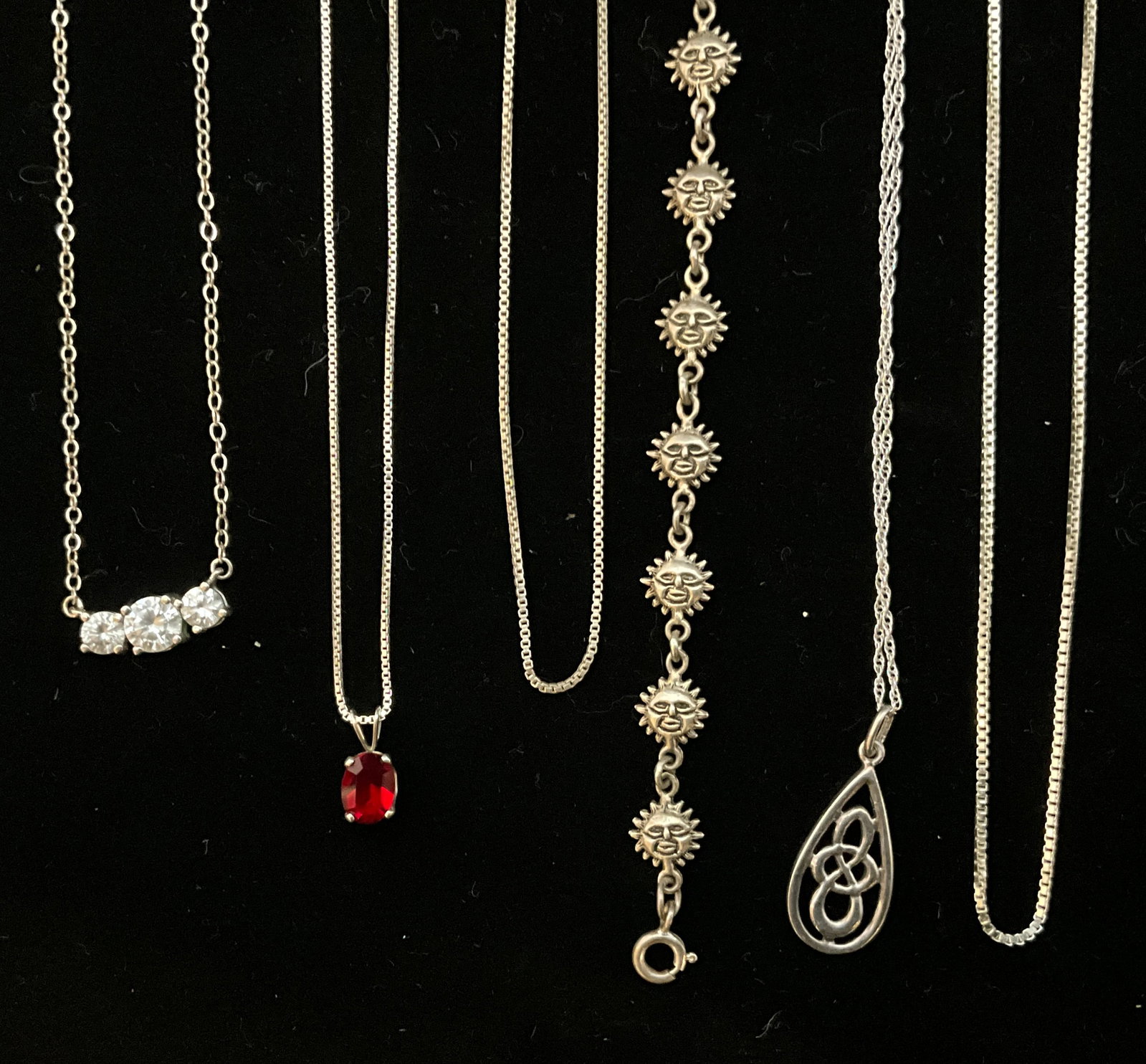 A Group of Seven Sterling Silver Necklaces and a Sun Face Motif Bracelet - 2