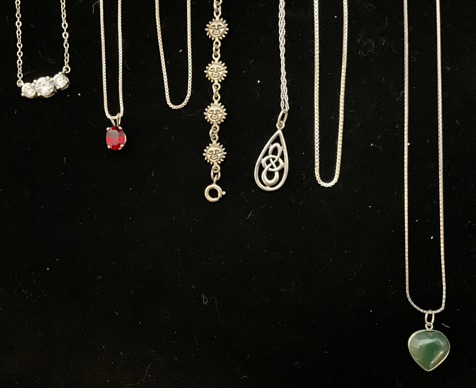 A Group of Seven Sterling Silver Necklaces and a Sun Face Motif Bracelet - 3
