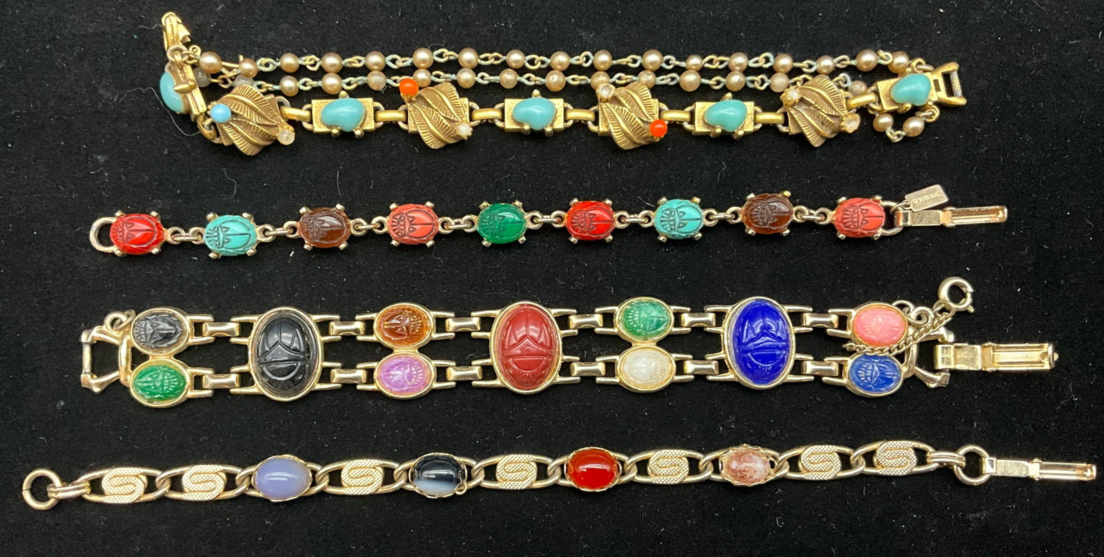 An Assortment of Egyptian Revival Scarab and Cabochon Costume Bracelets - 2