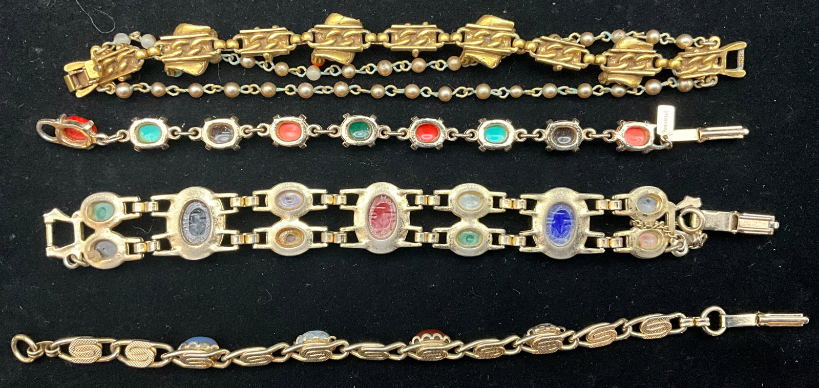An Assortment of Egyptian Revival Scarab and Cabochon Costume Bracelets - 3