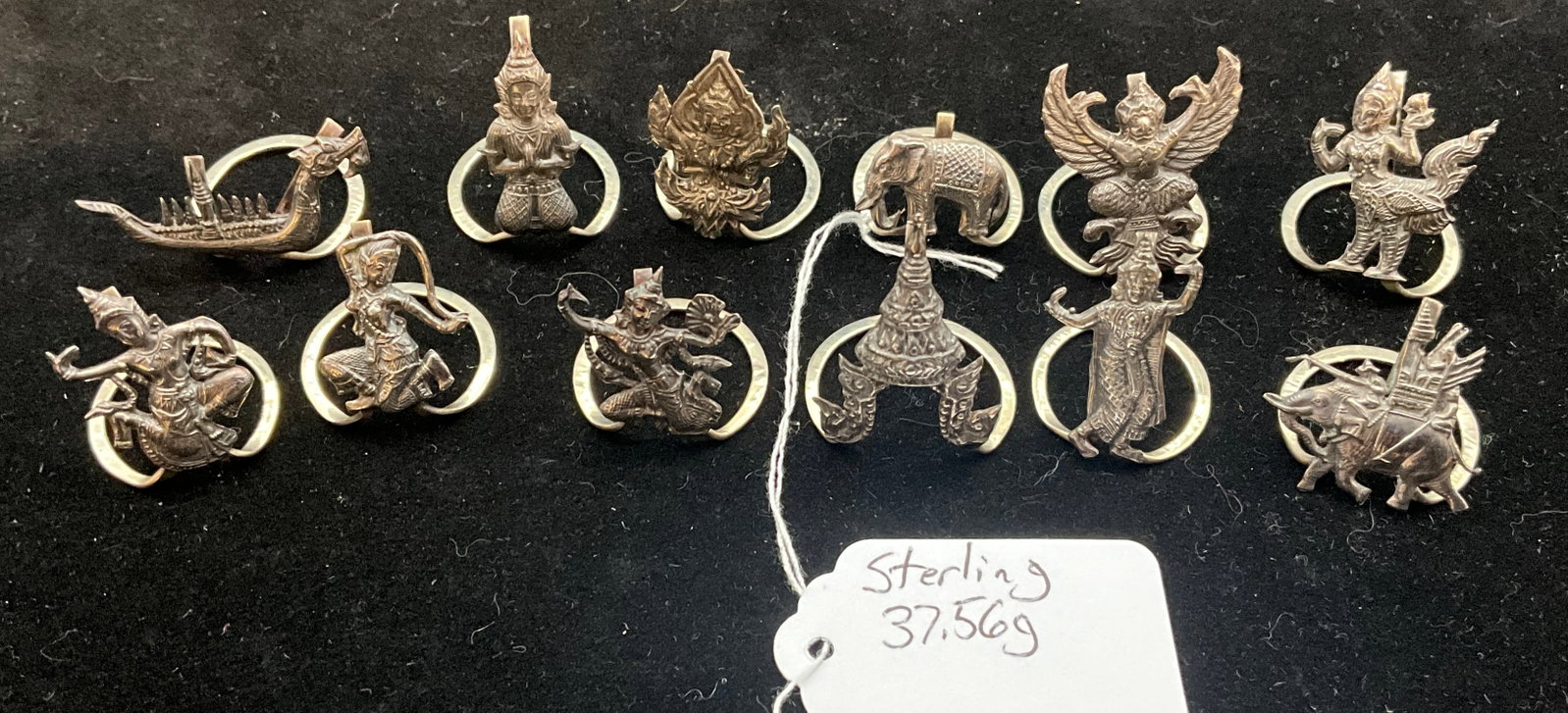 An Assortment of Thai Sterling Silver Scarf Rings - 2
