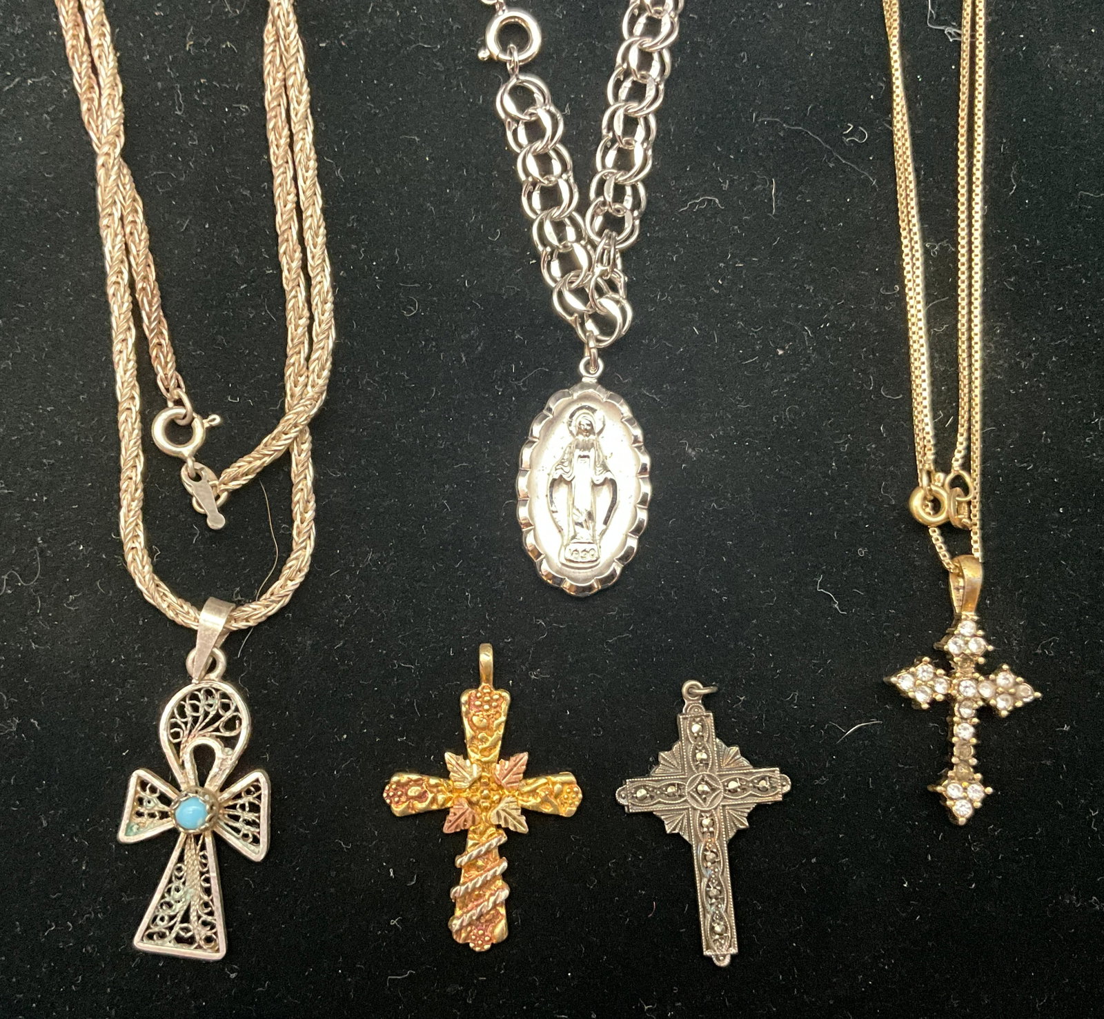 A Collection of Sterling Silver Religious Jewelry - 2
