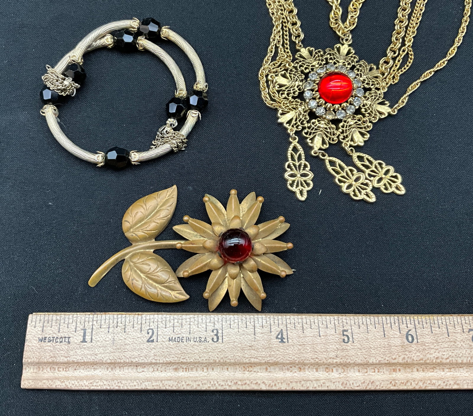 An Assortment of Vintage Gold Tone Costume Jewelry - 2