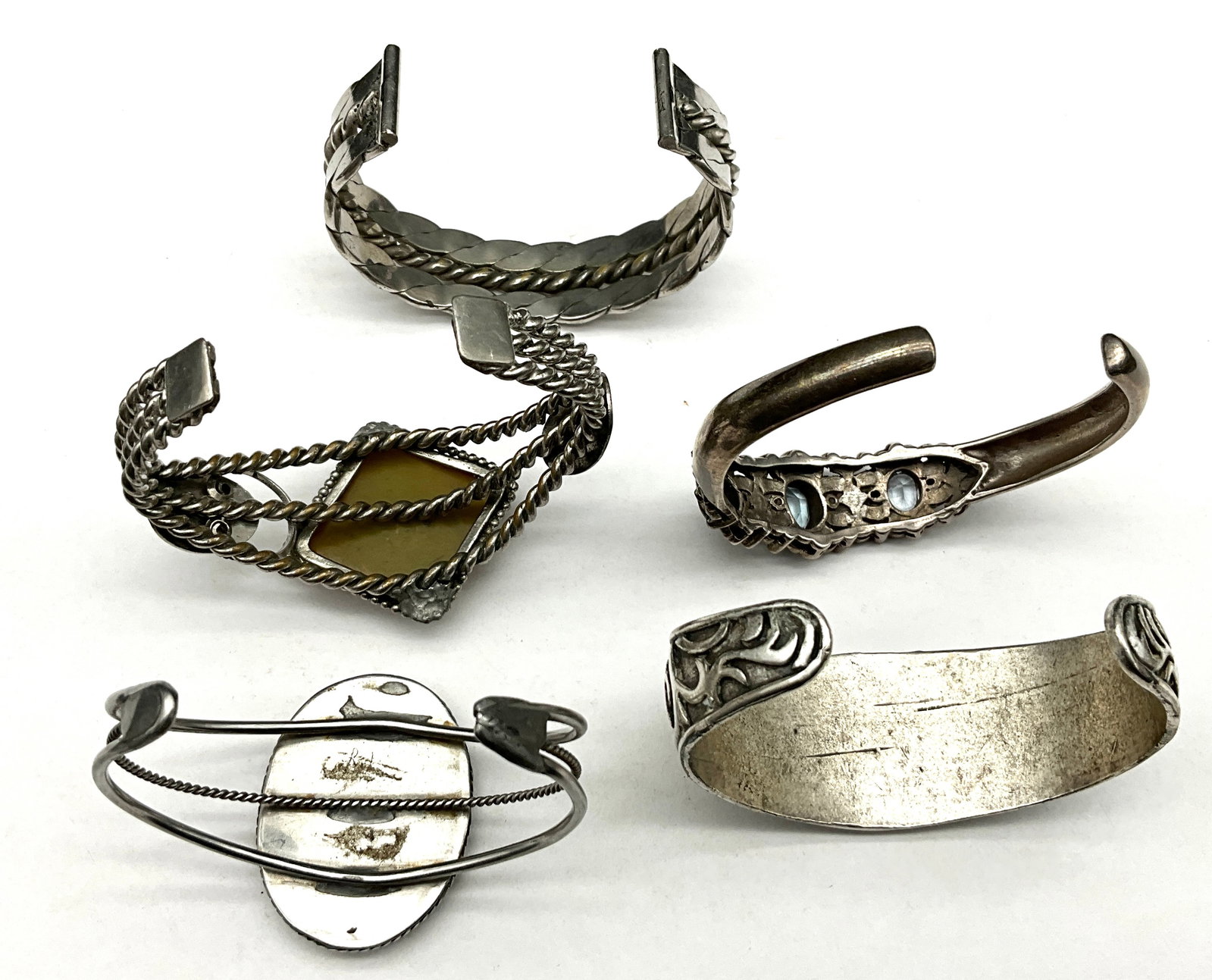 A Collection of Vintage Silver-Tone Mixed Style Cuff Bracelets - 4