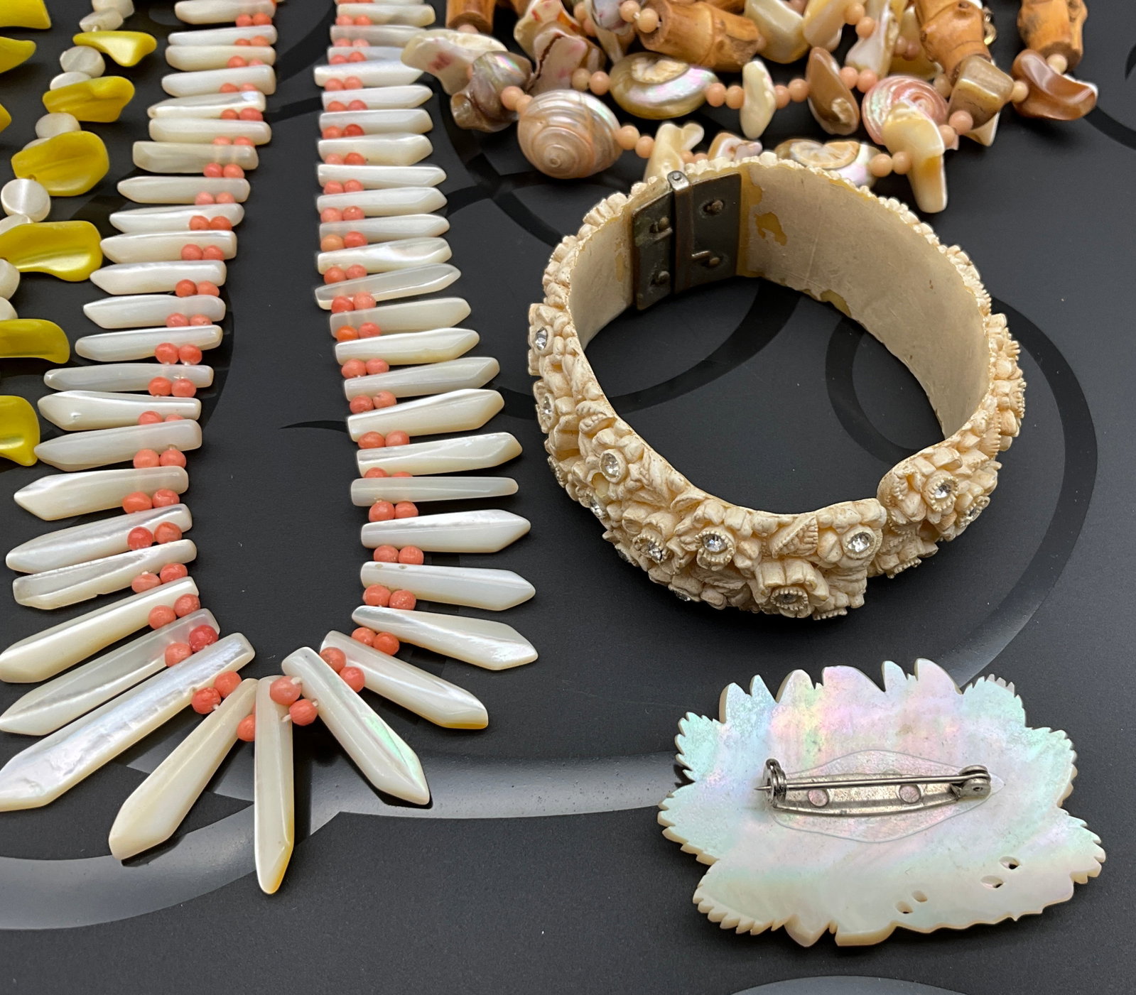 A Group of Mid-Century Shell, Coral, and Carved Floral Costume Jewelry - 3