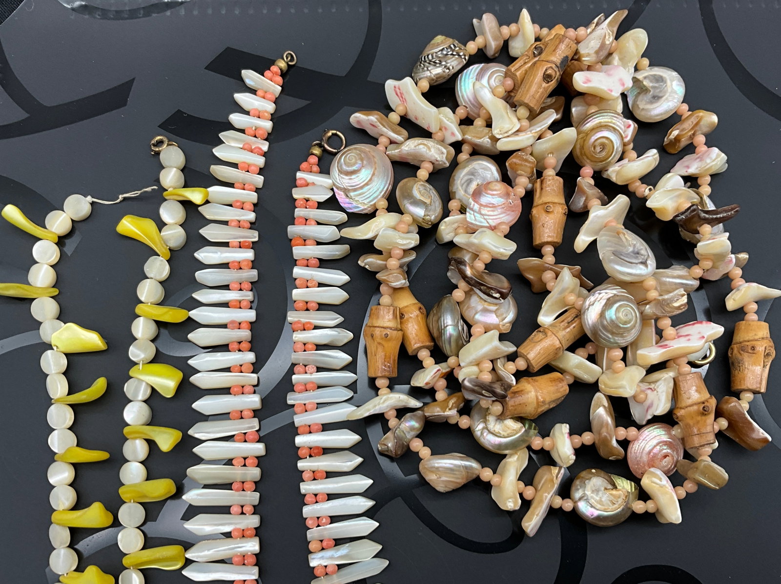 A Group of Mid-Century Shell, Coral, and Carved Floral Costume Jewelry - 4