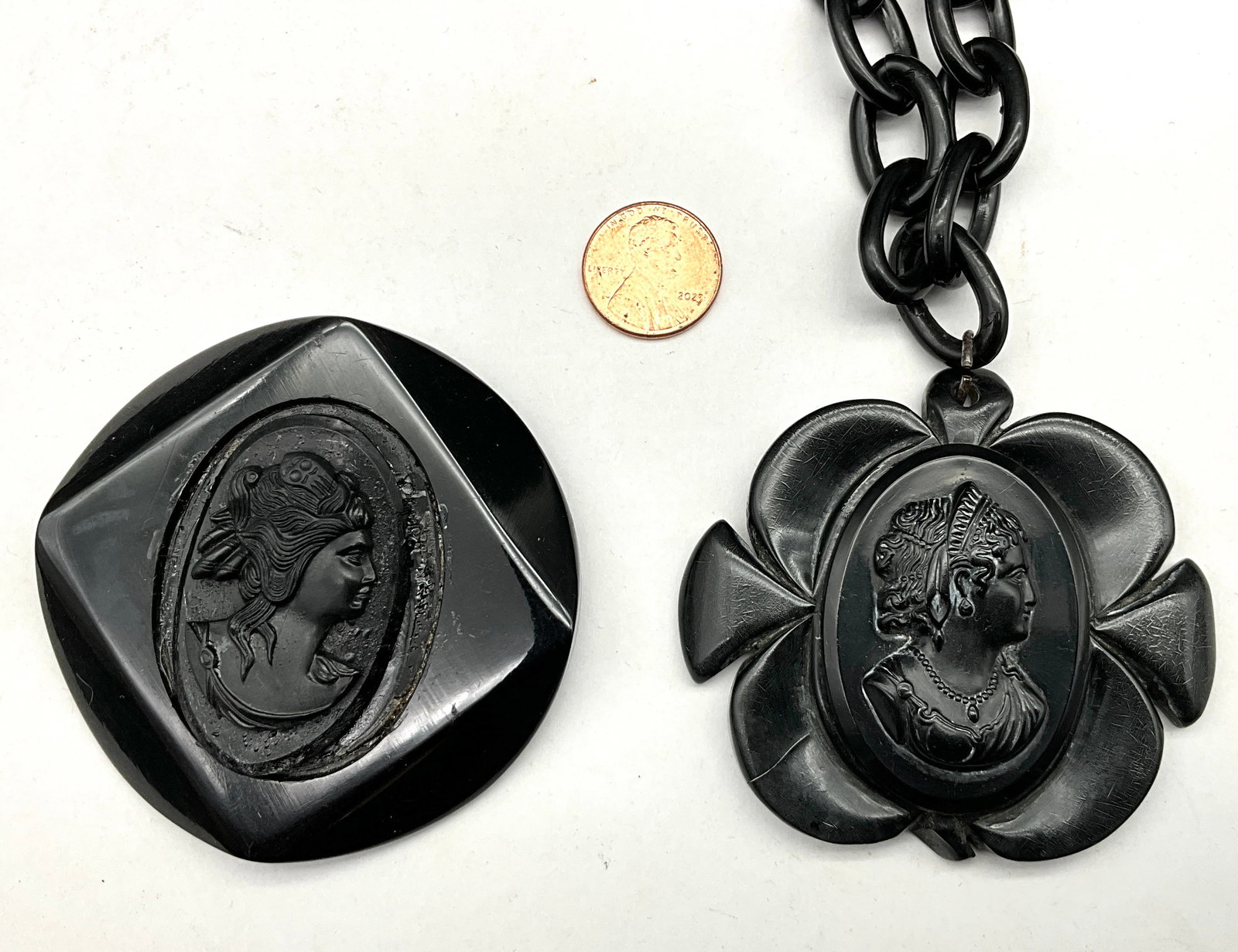 A Pair of Victorian Revival Black Plastic Cameo Jewelry Pieces - 2