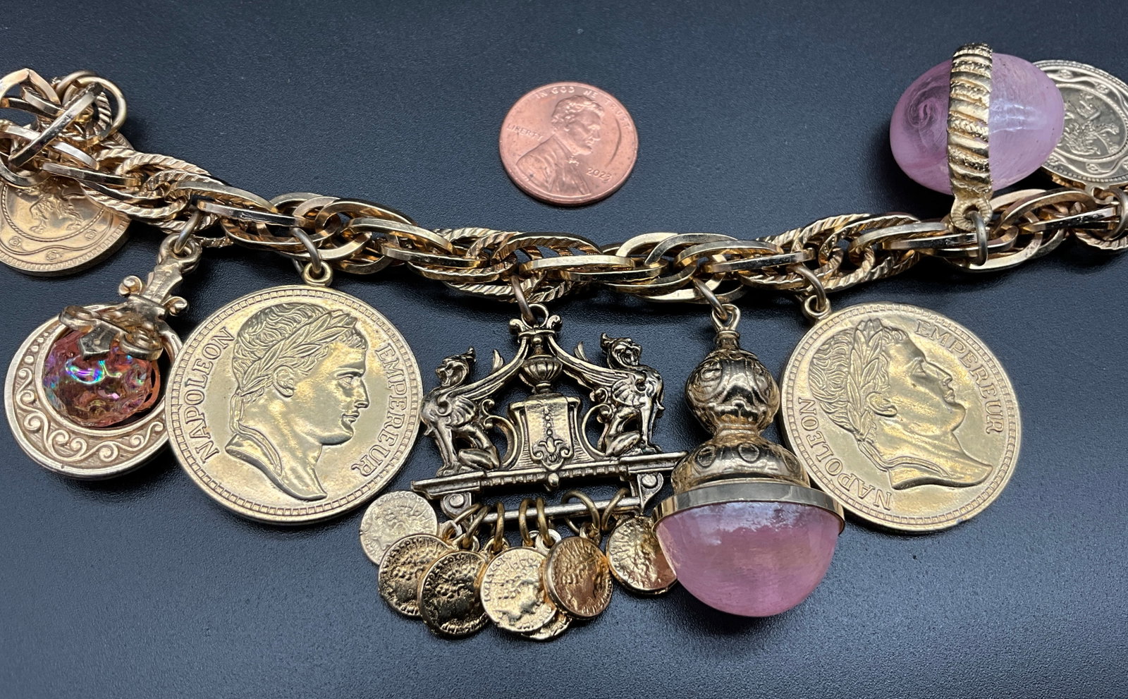 A Collection of Four Vintage Gold-Tone Costume Jewelry Charm and Button Bracelets - 6