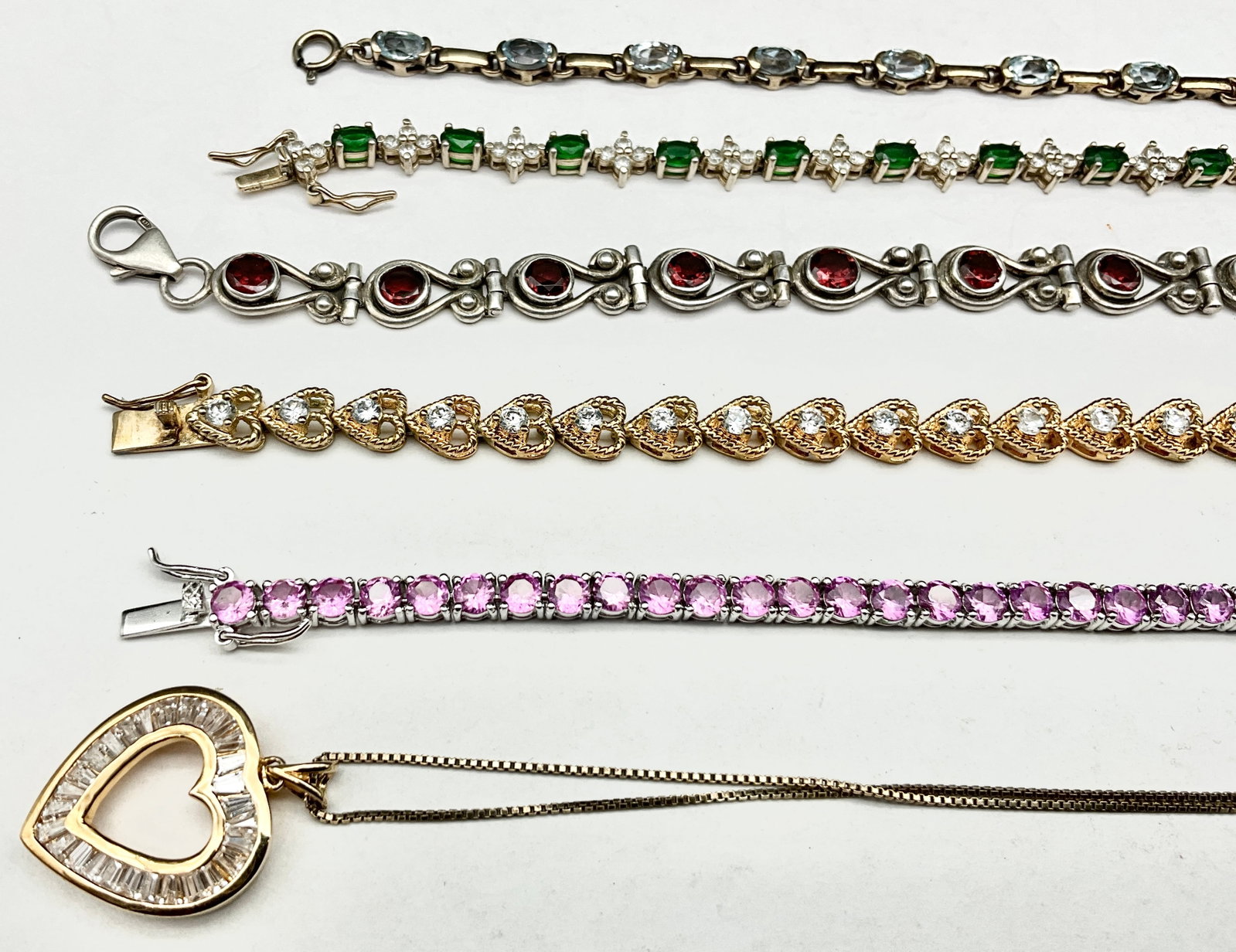 A Collection of Sterling Silver and Colored Gemstone Jewelry - 2