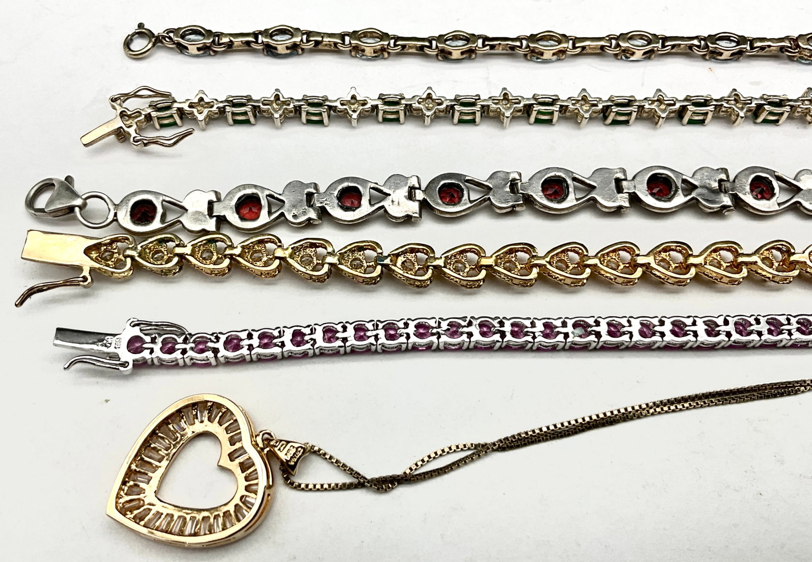 A Collection of Sterling Silver and Colored Gemstone Jewelry - 4