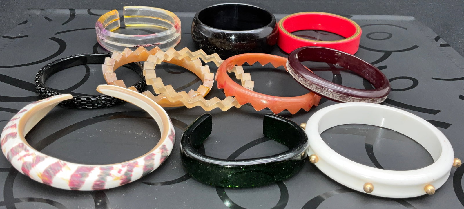 A Collection of 11 Vintage Bakelite and Assorted Plastic Bangle and Cuff Bracelets - 2