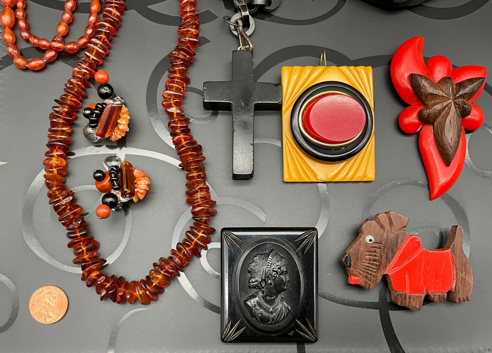 A Collection of Vintage Bakelite, Amber, and Costume Jewelry - 2