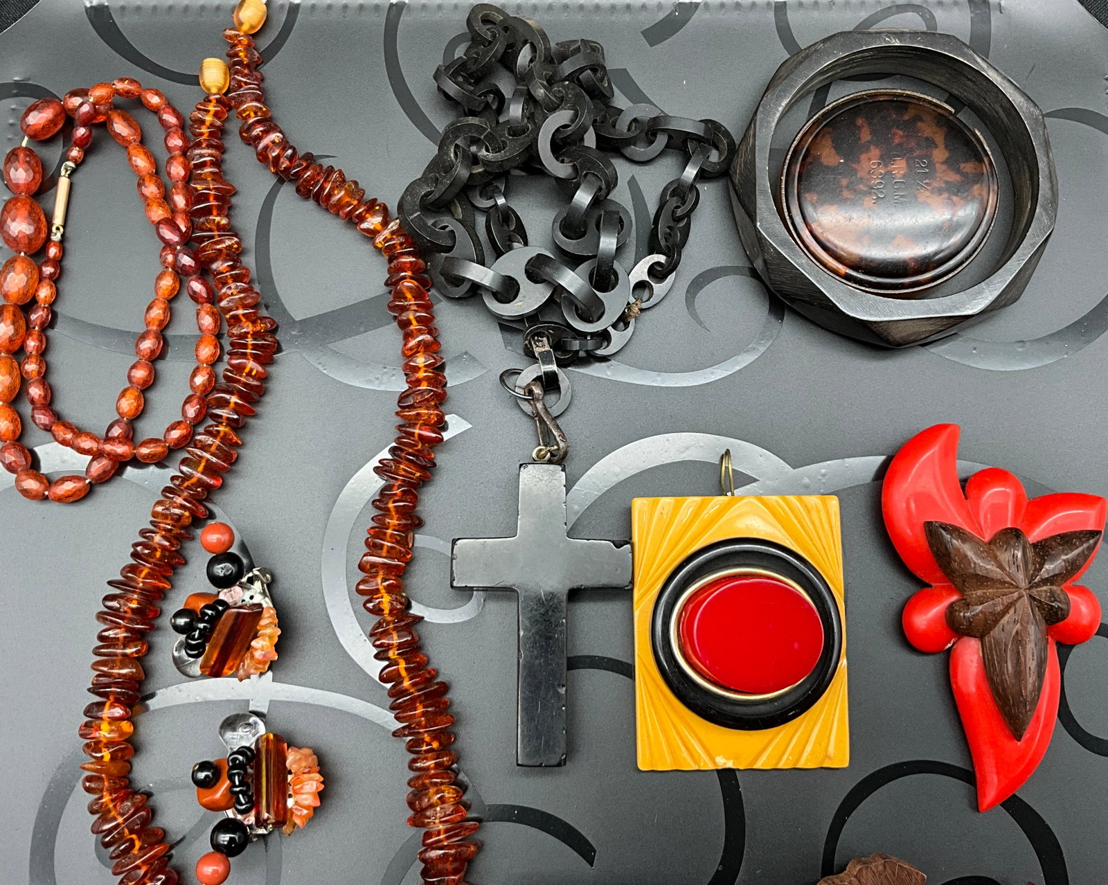 A Collection of Vintage Bakelite, Amber, and Costume Jewelry - 3