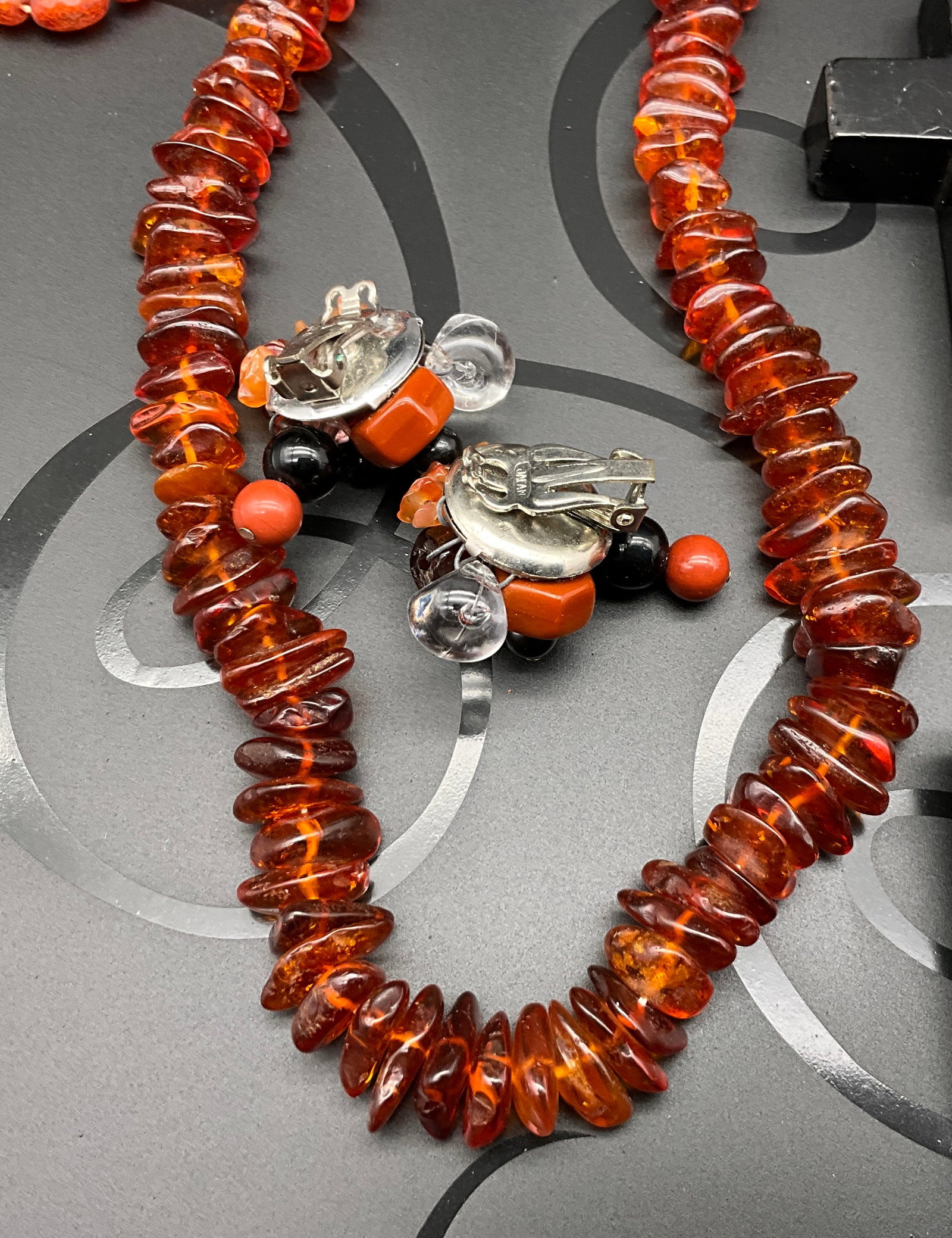 A Collection of Vintage Bakelite, Amber, and Costume Jewelry - 5
