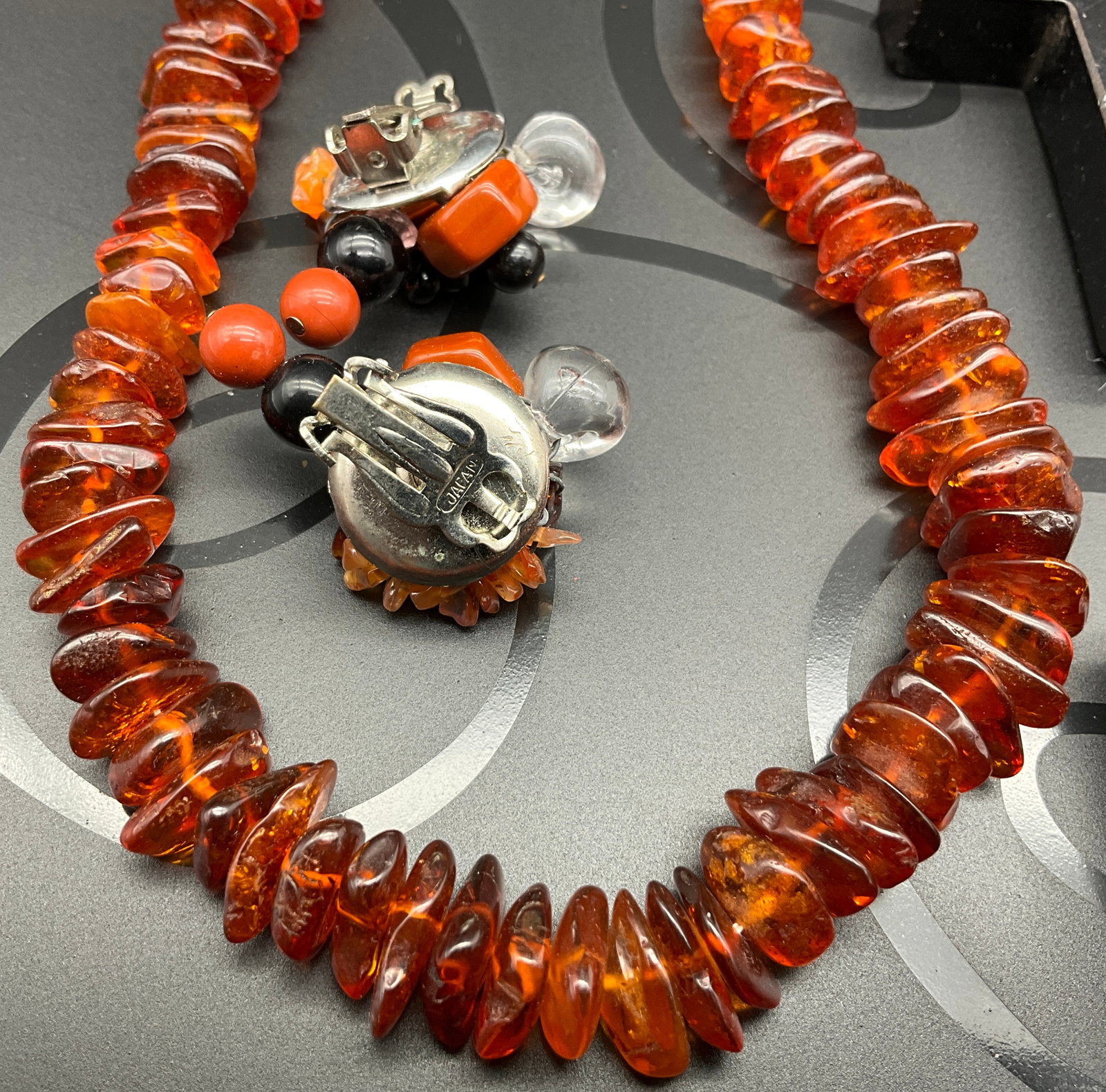 A Collection of Vintage Bakelite, Amber, and Costume Jewelry - 6