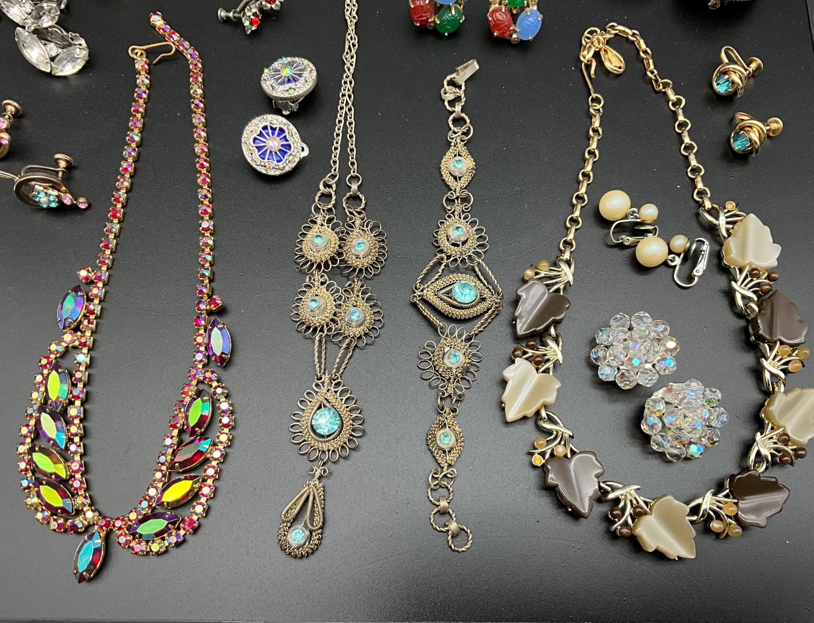 An Assortment of Vintage Rhinestone and Thermoset Costume Jewelry - 3