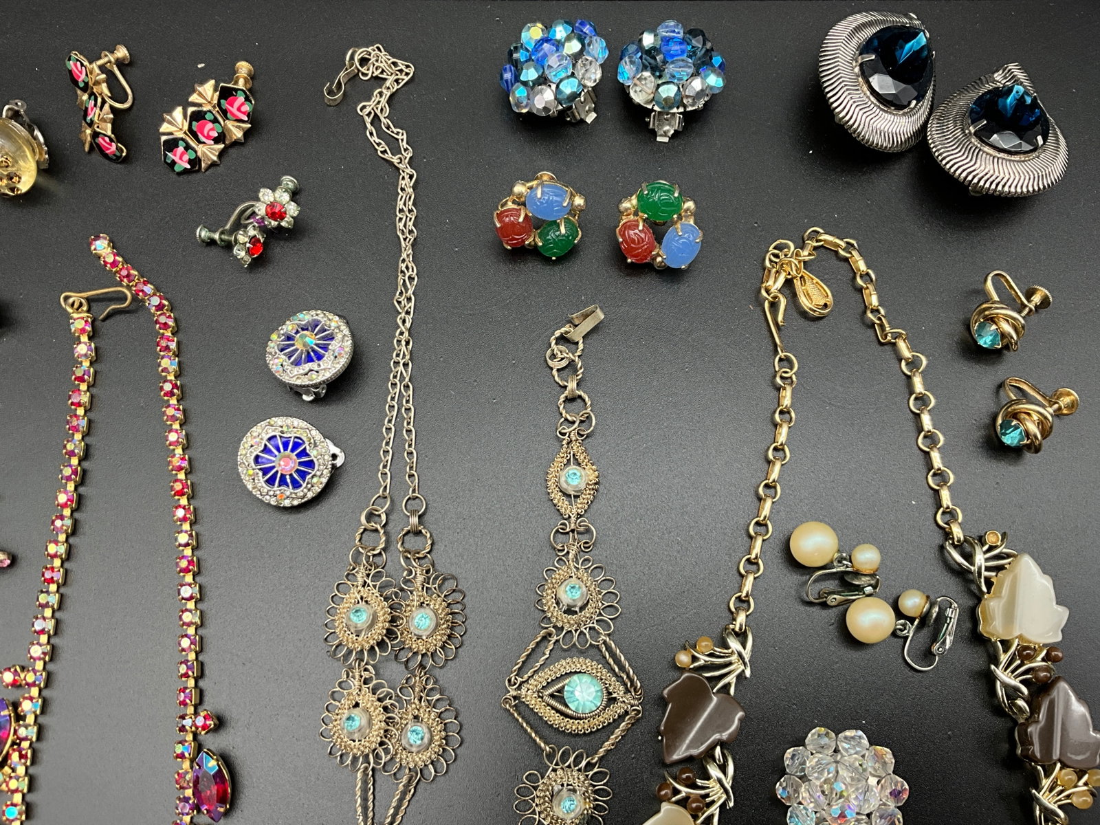 An Assortment of Vintage Rhinestone and Thermoset Costume Jewelry - 4