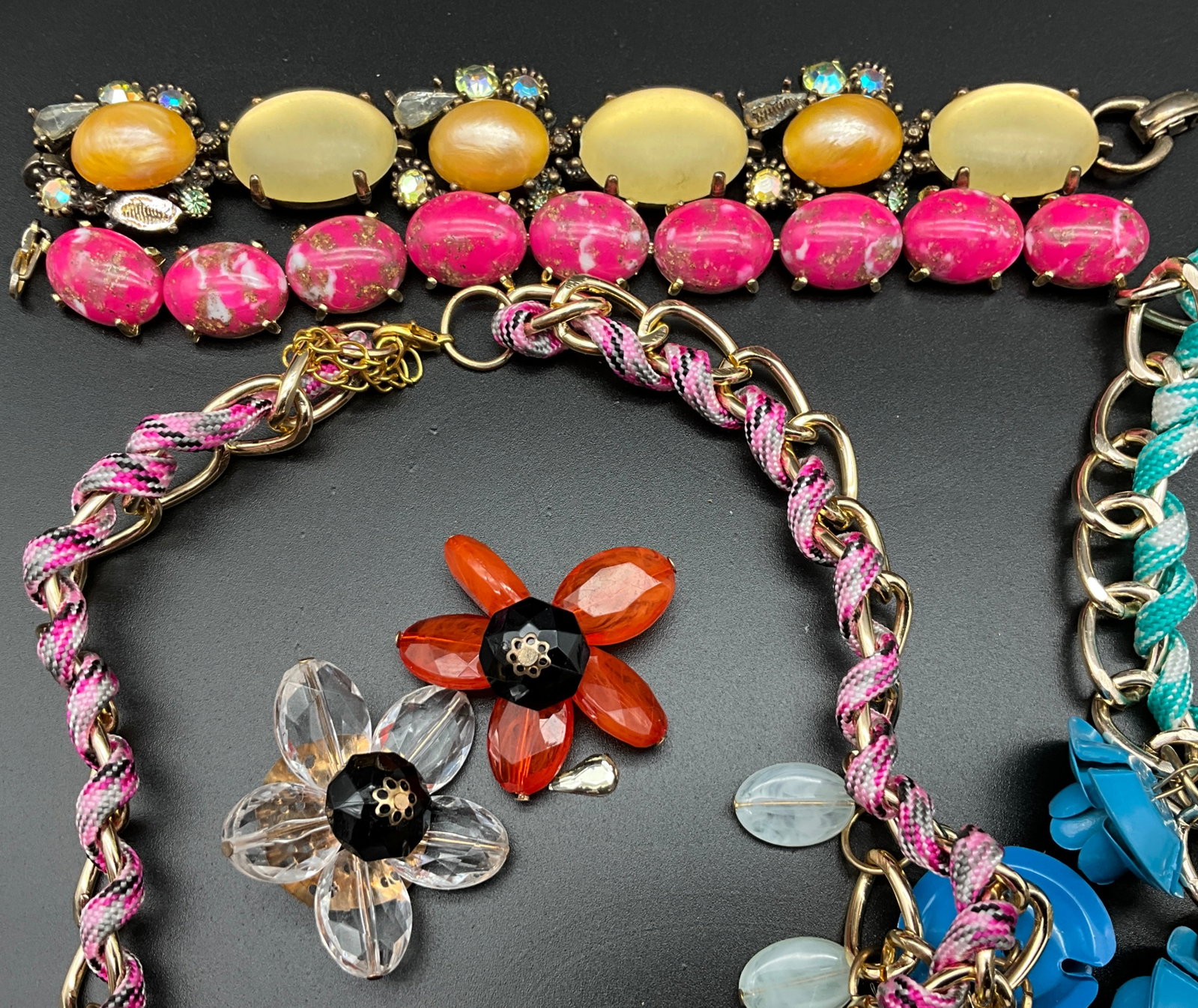 An Assortment of Colorful Floral Costume Jewelry - 3