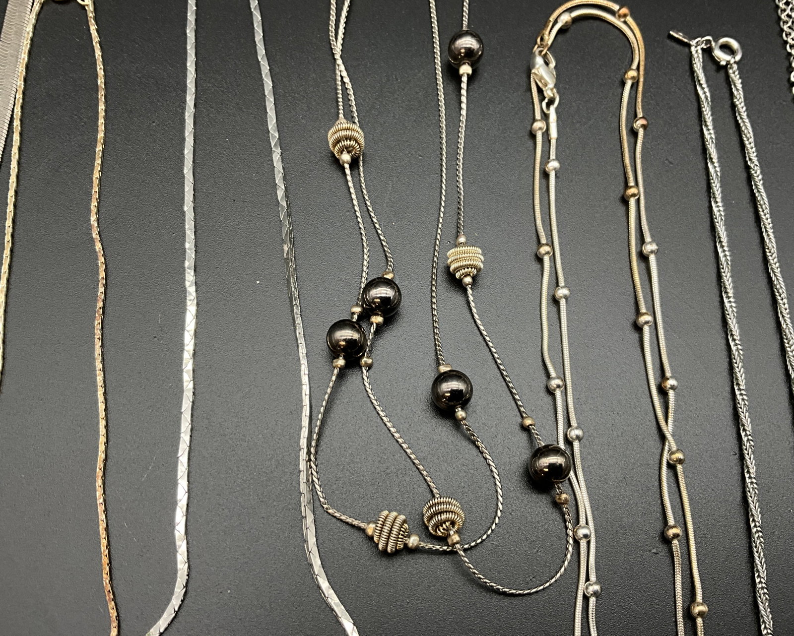 A Collection of Vintage Silver and Gold Tone Costume Jewelry - 4