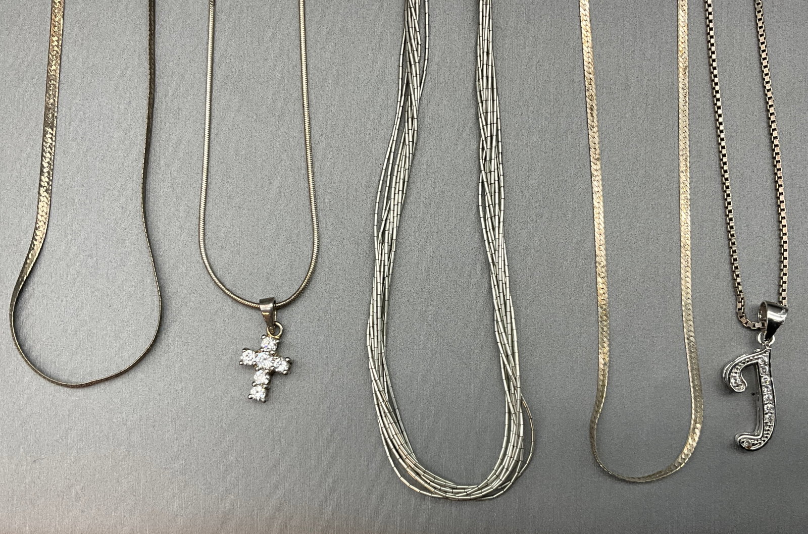 A Collection of Vintage Sterling Silver Necklaces with Pendants - 2