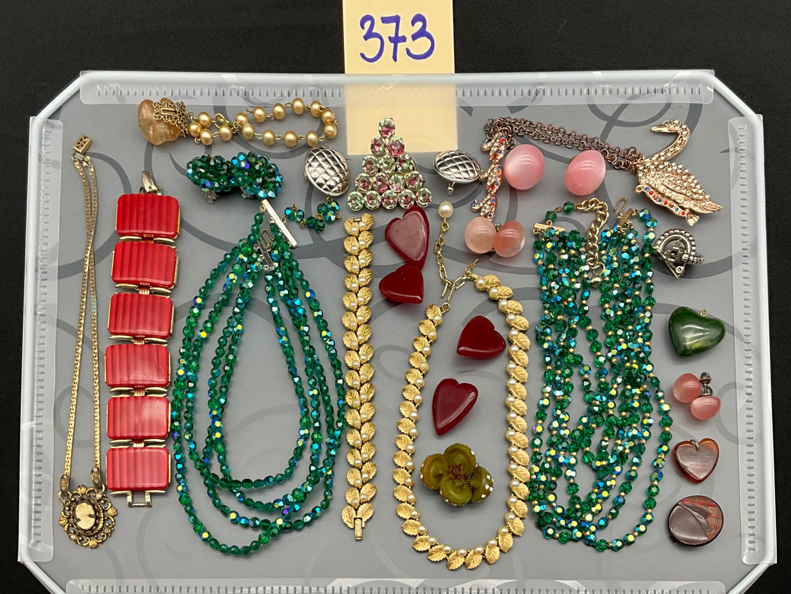 Vintage Mid-Century Glass and Faux Pearl Costume Jewelry Collection: This vintage collection consists of various costume jewelry pieces including multi-strand aurora borealis glass bead necklaces and matching earrings. The lot also features a gold-tone collar necklace