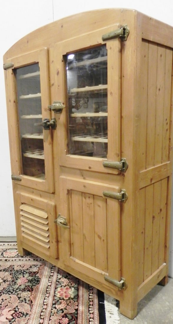 WINE COOLER: HEAVY WINE COOLER WITH 3 STORAGE SPACES AND GLASS DOORS MEASURES 48"W X 21"D X 74"H