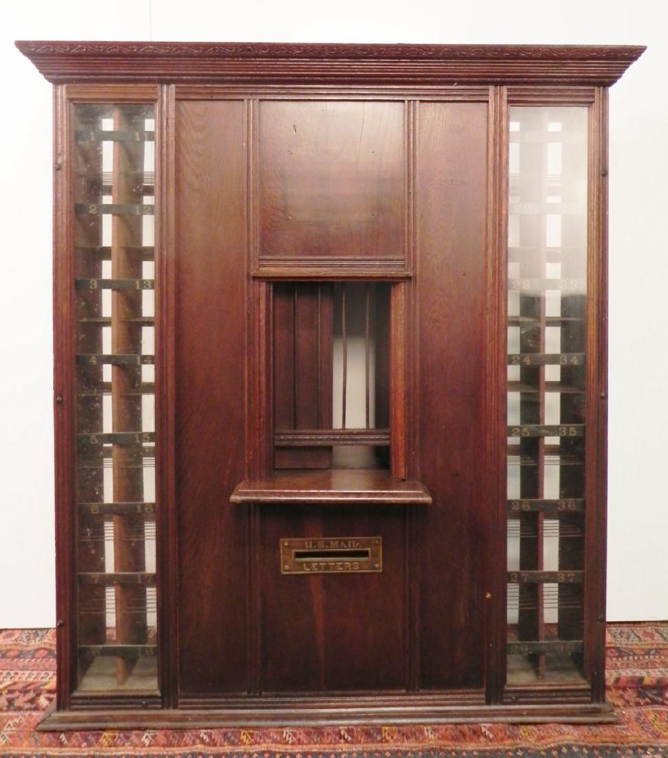 POST OFFICE BOX: US MAIL ANTIQUE POST OFFICE WINDOW WITH MAIL SLOT. MEASURES 48"H X 9"D X 43"W.