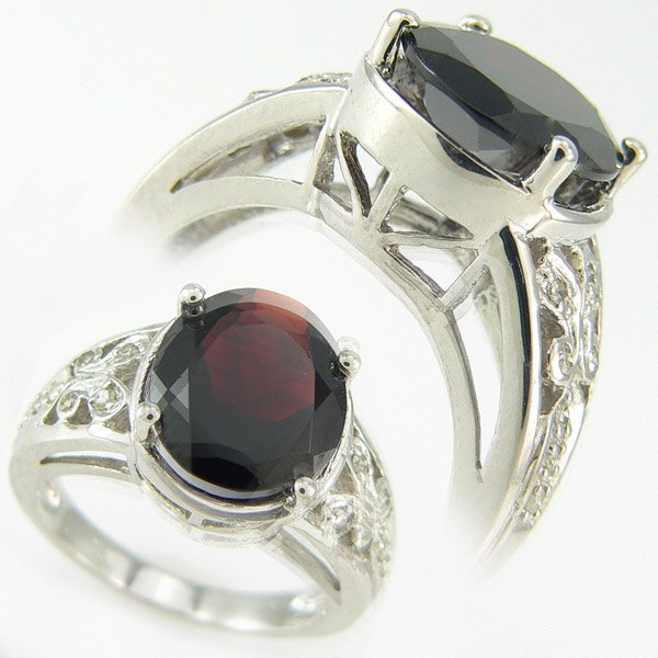 DIAMOND & GARNET RING 6.15 CTW 10KT. GOLD