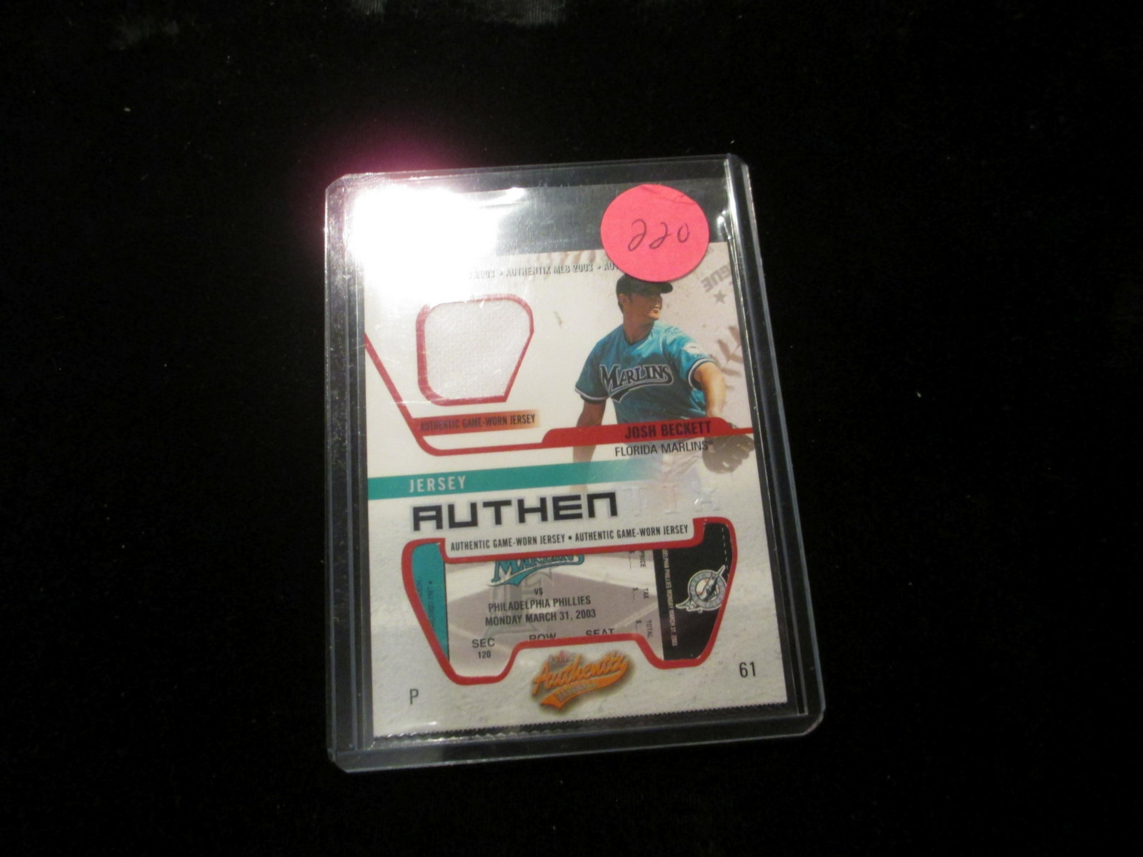 2003 fleer josh becket jersey and piece of ticket stubb: marlins