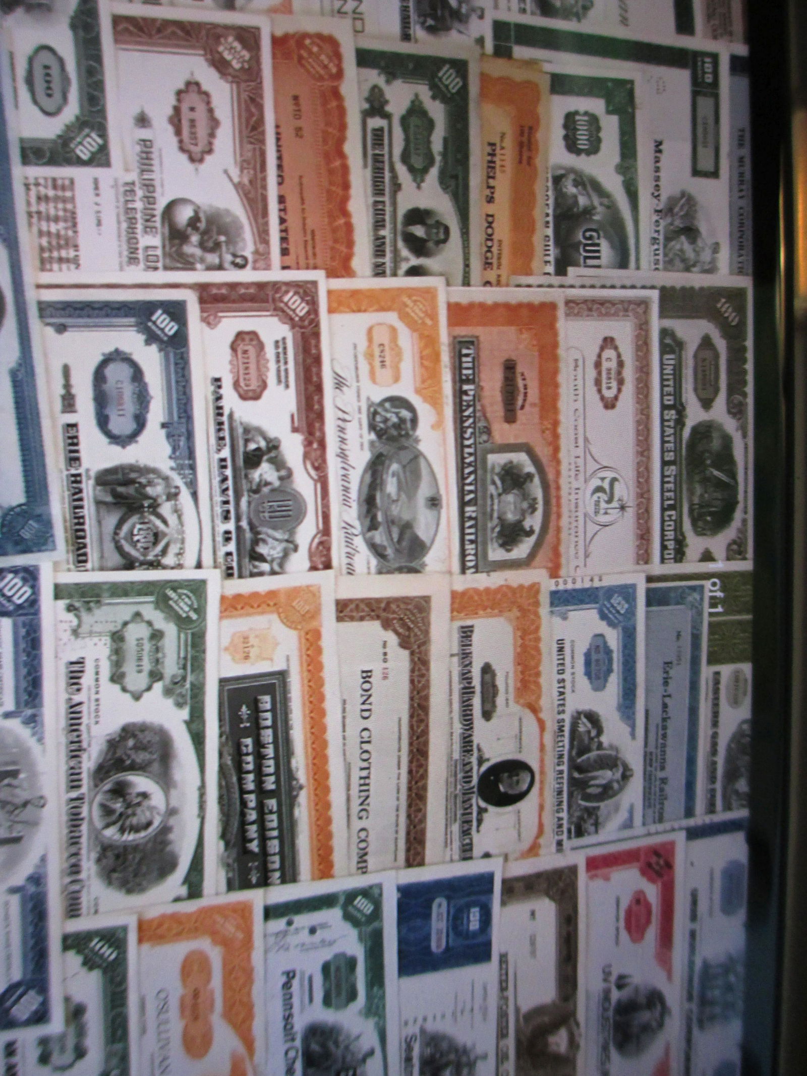 lot of 100 assorted stock certificates (1 of 1)