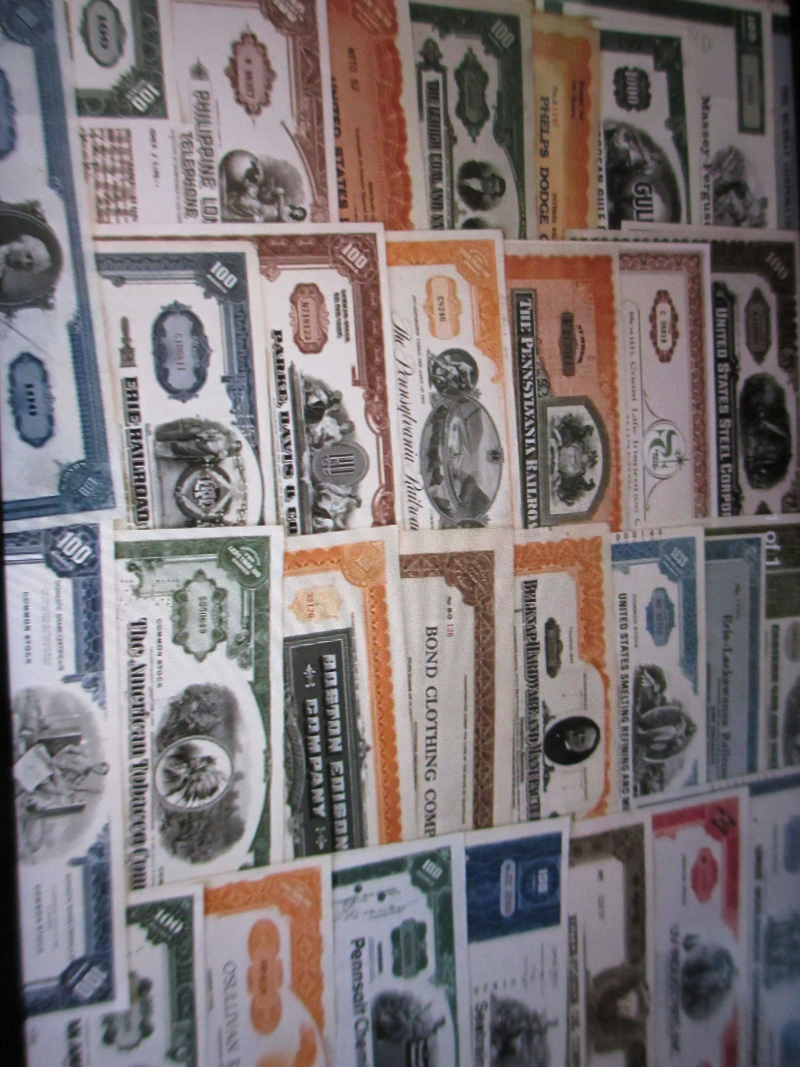 lot of 100 assorted stock certificates (1 of 1)