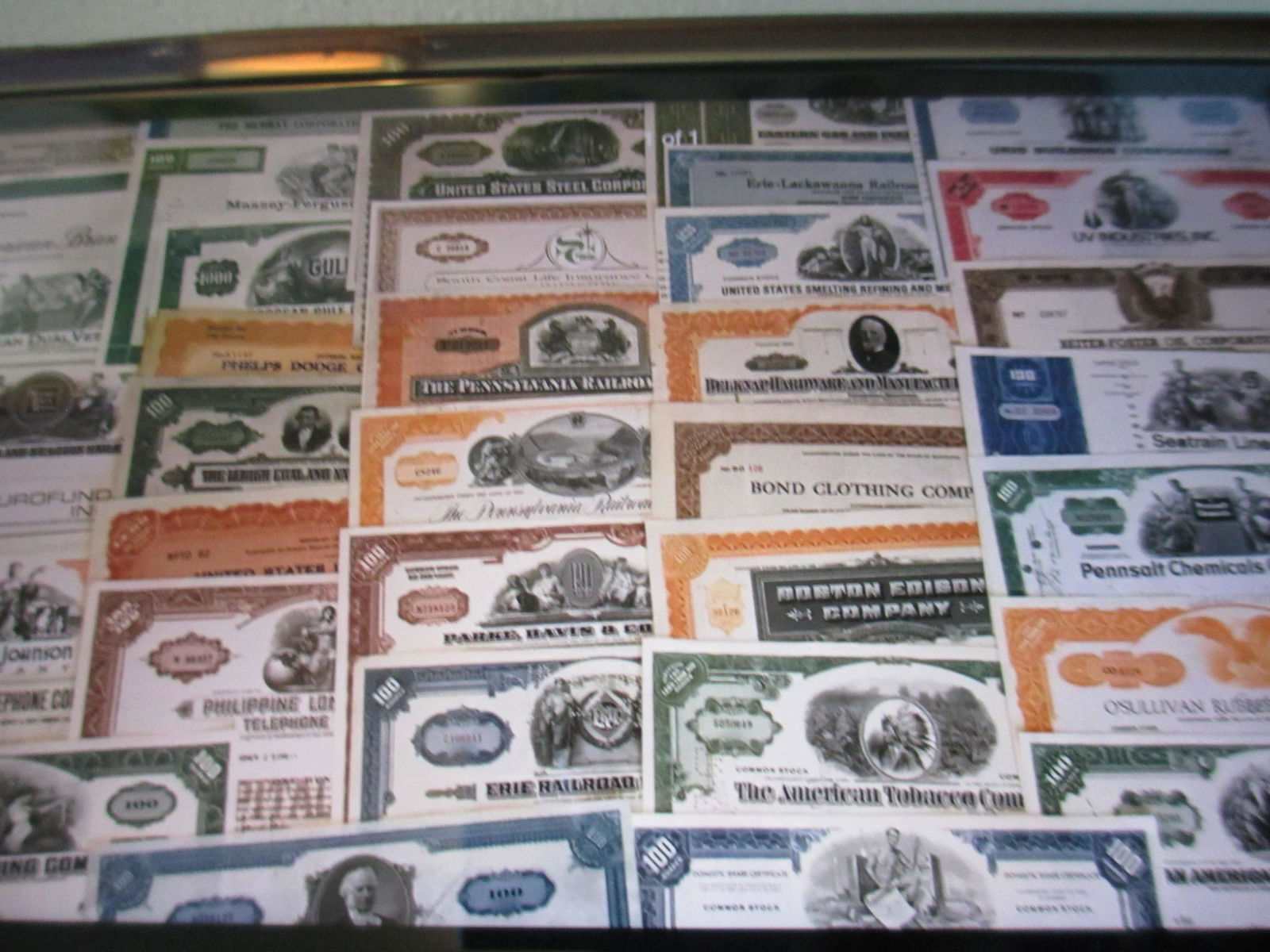 lot of 100 assorted stock certificates (1 of 1)