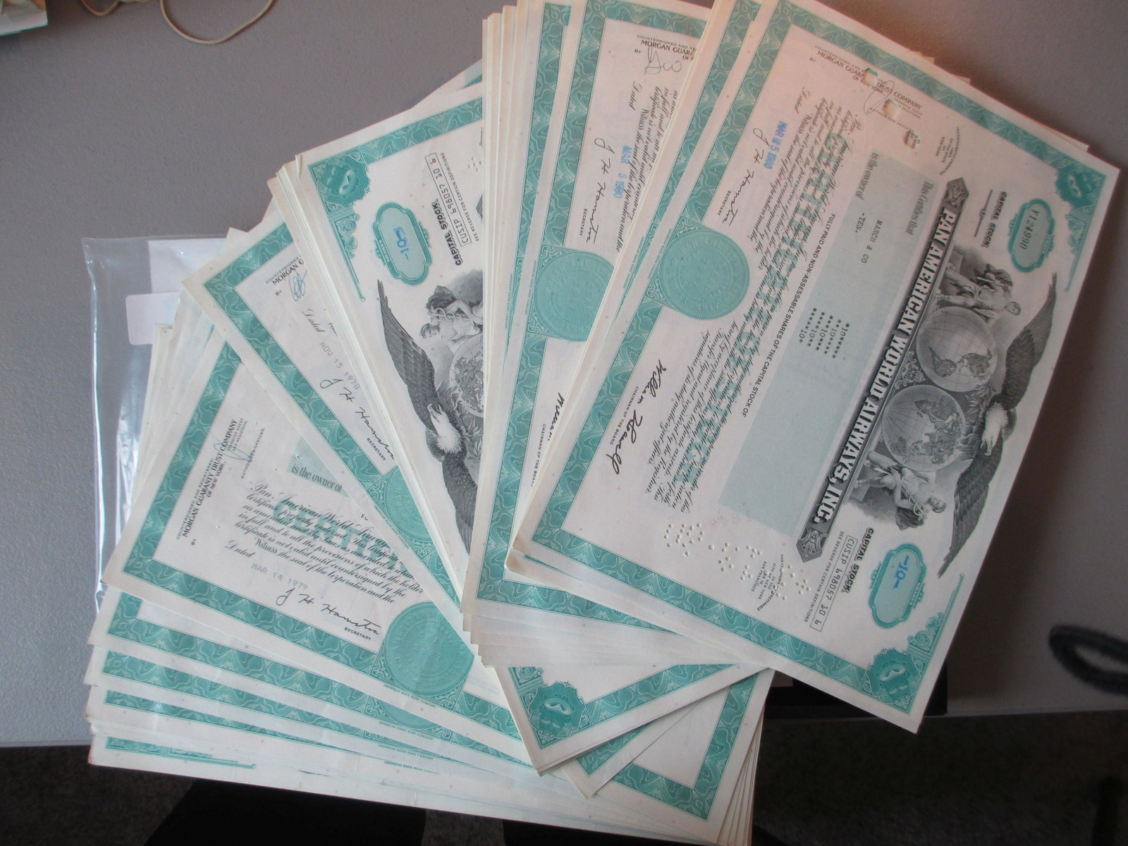 lot of 100 pan american world airways inc stock: all original stock certificate hoard