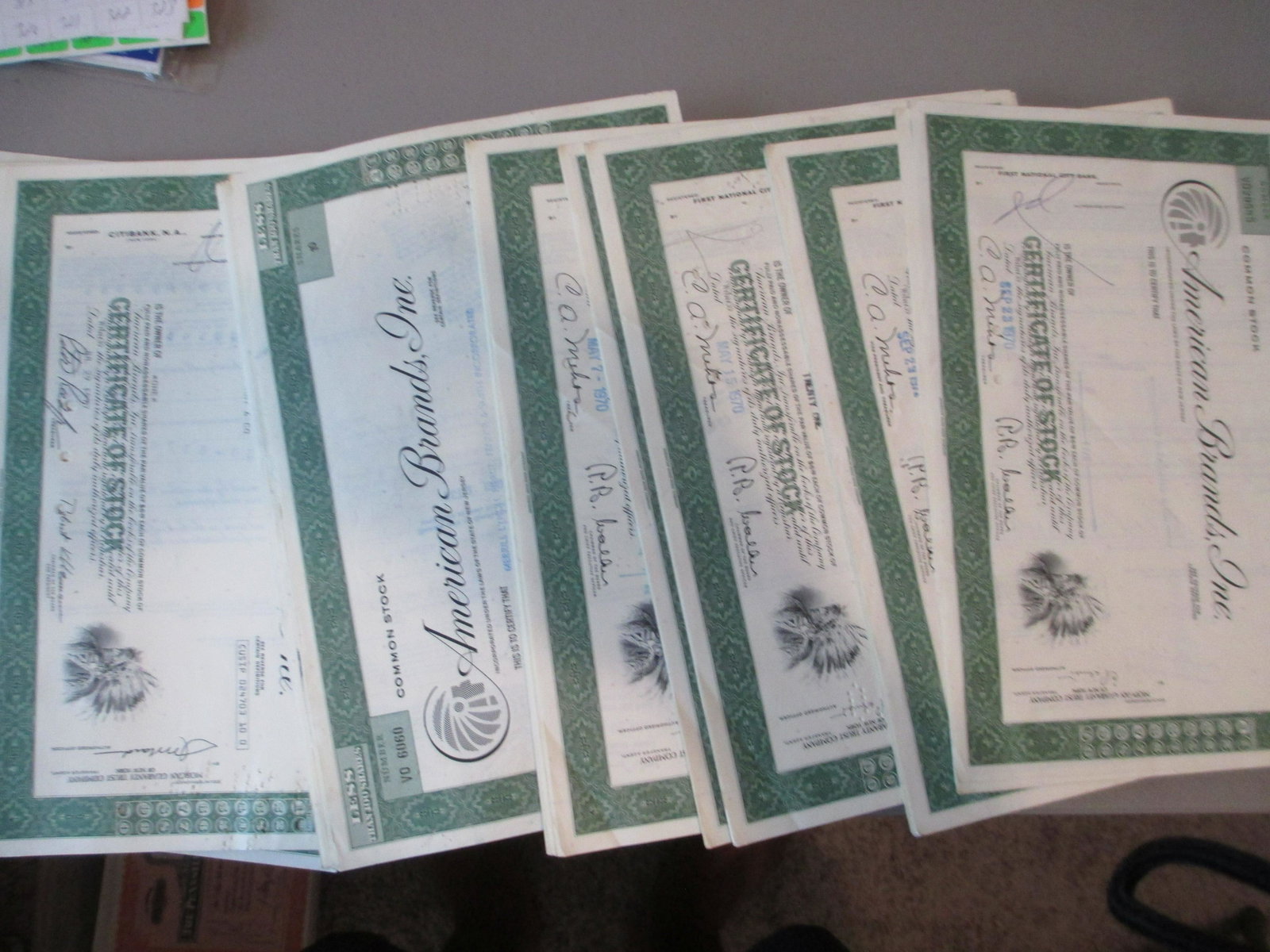 lot of 100 american brands inc,stock certificates: huge monster lot